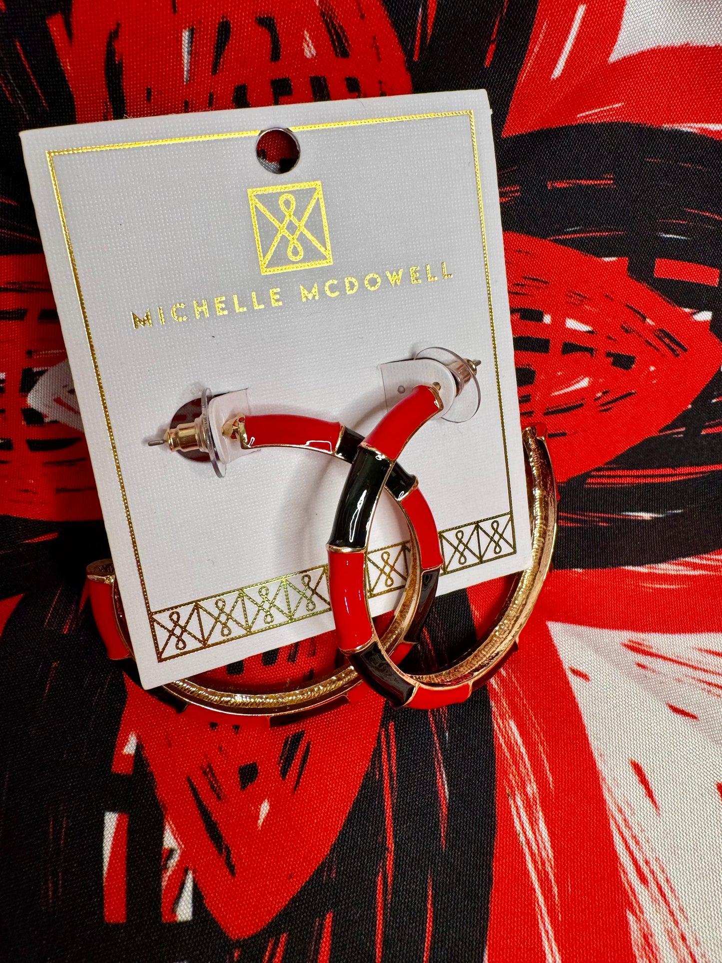 Med size gold metal black and red hoops