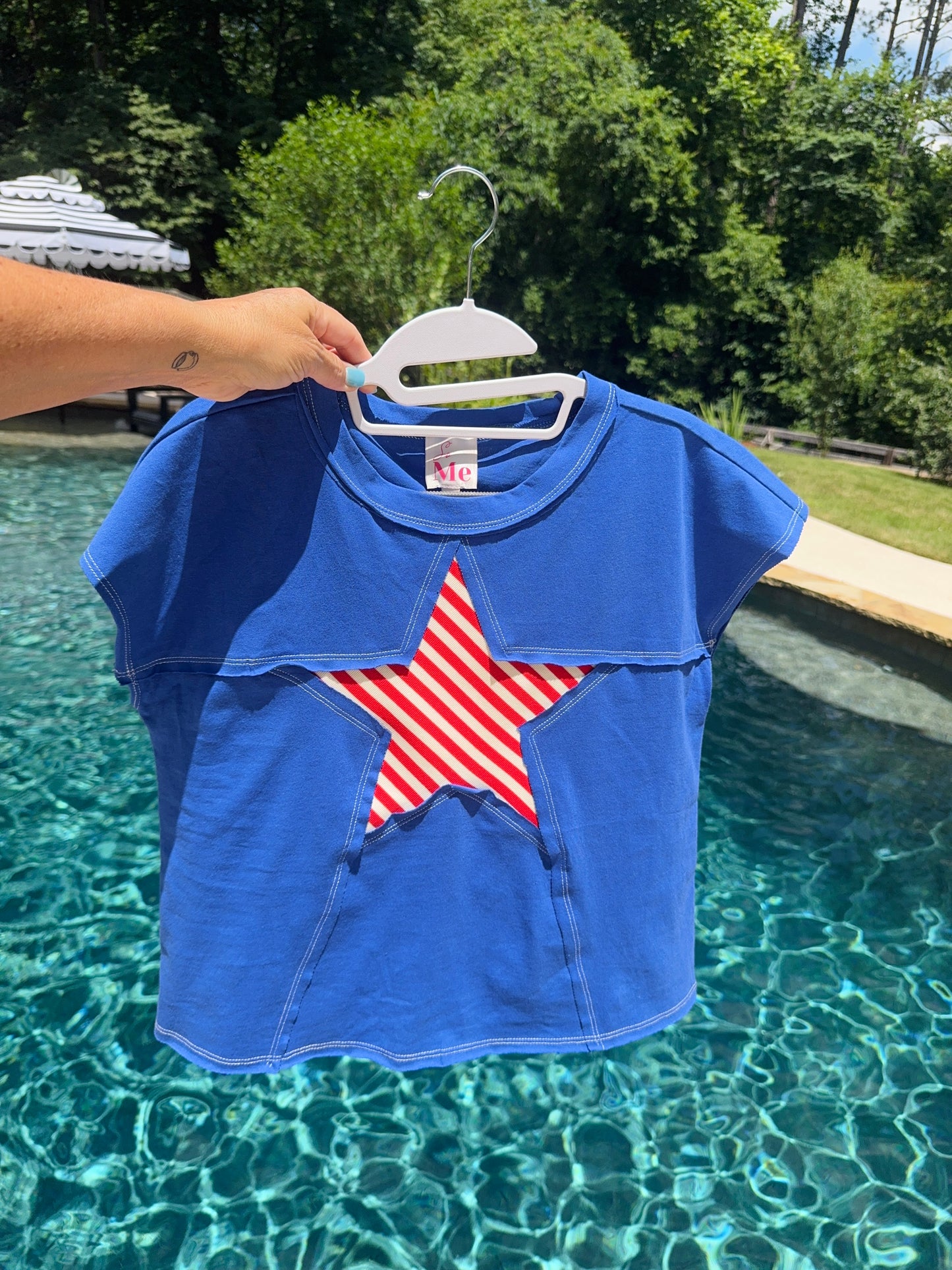 Blue shirt striped star marked down