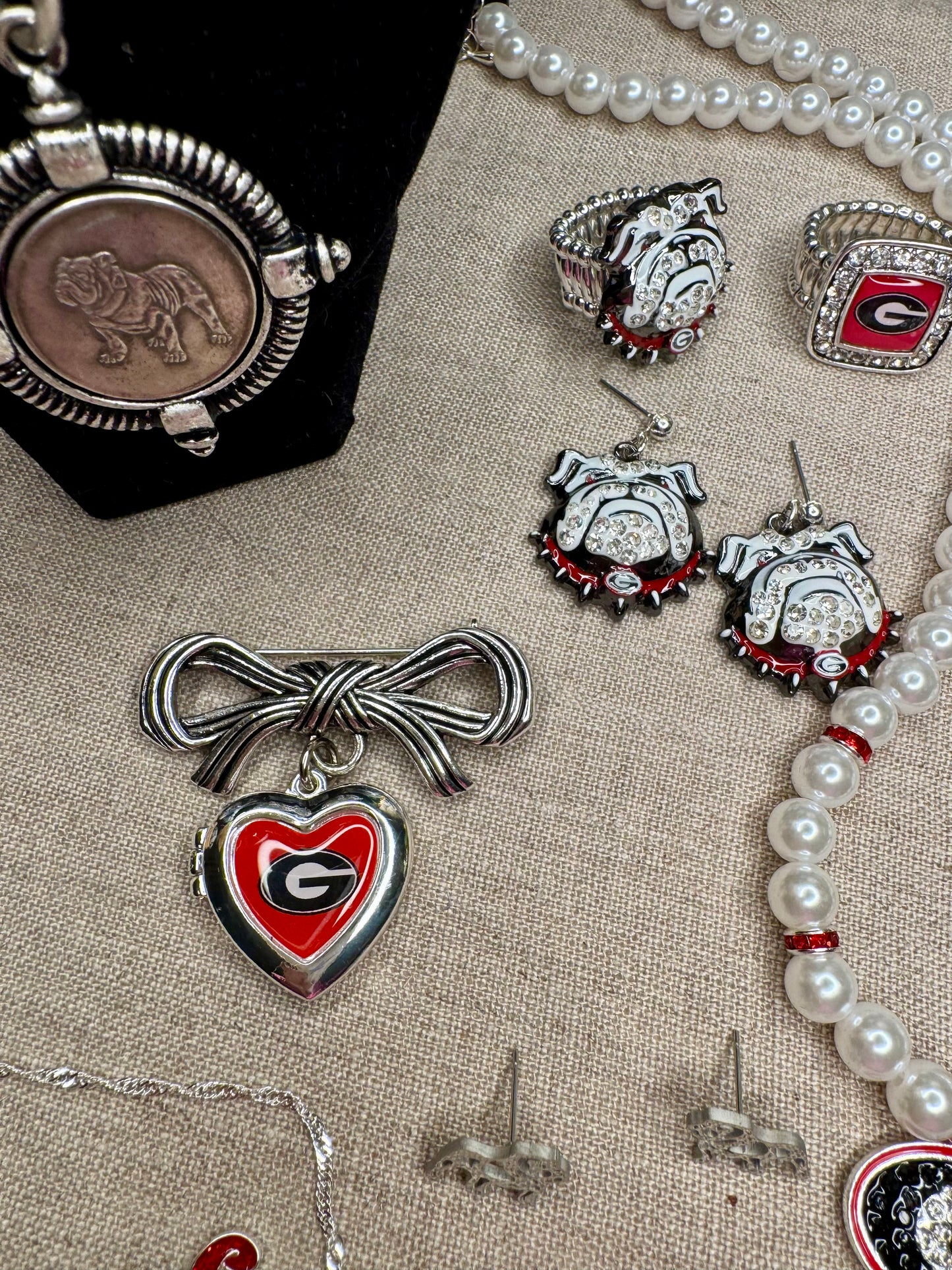 Brooch with bow and Georgia locket