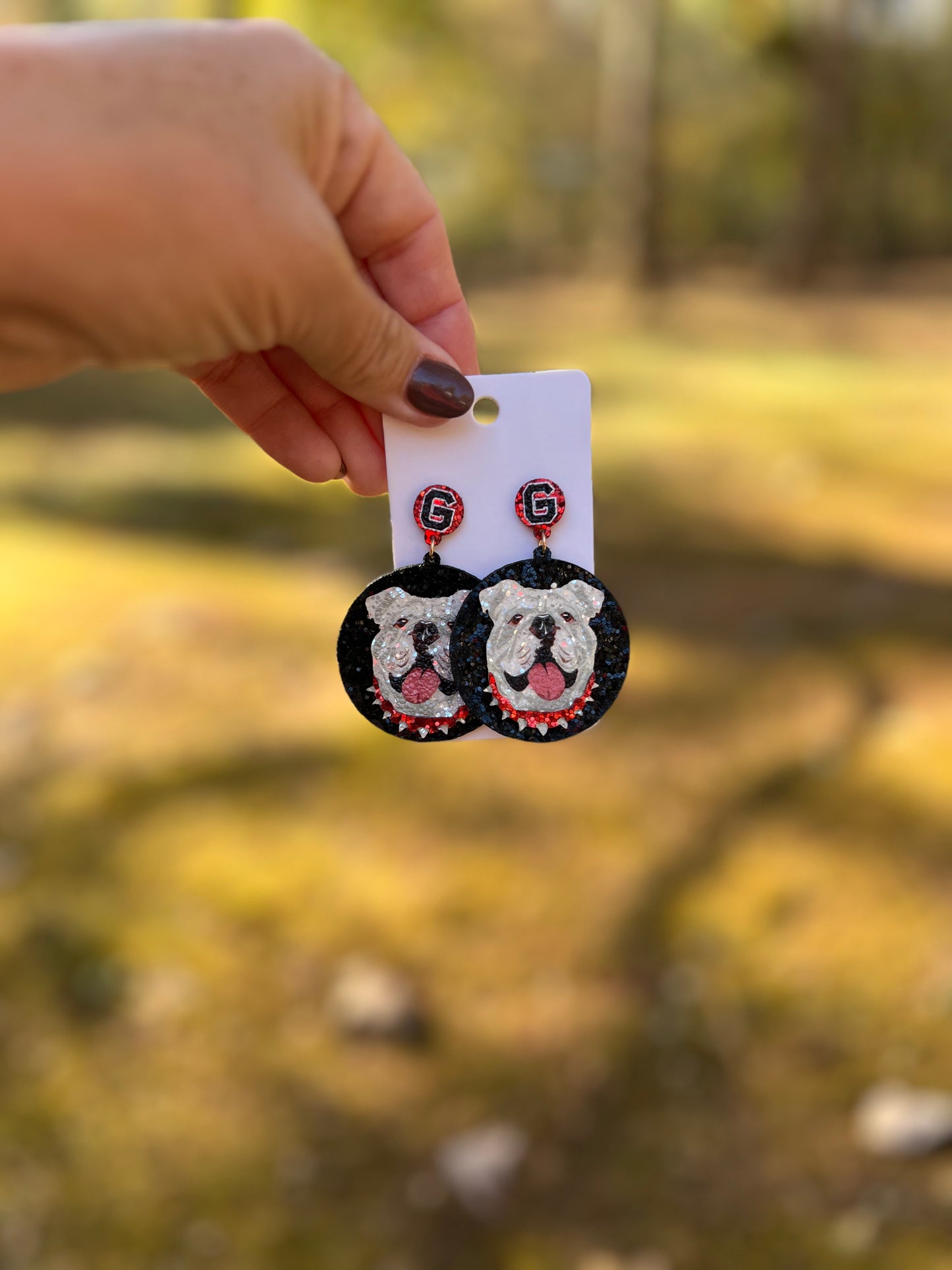 Black background dog earrings sparkly