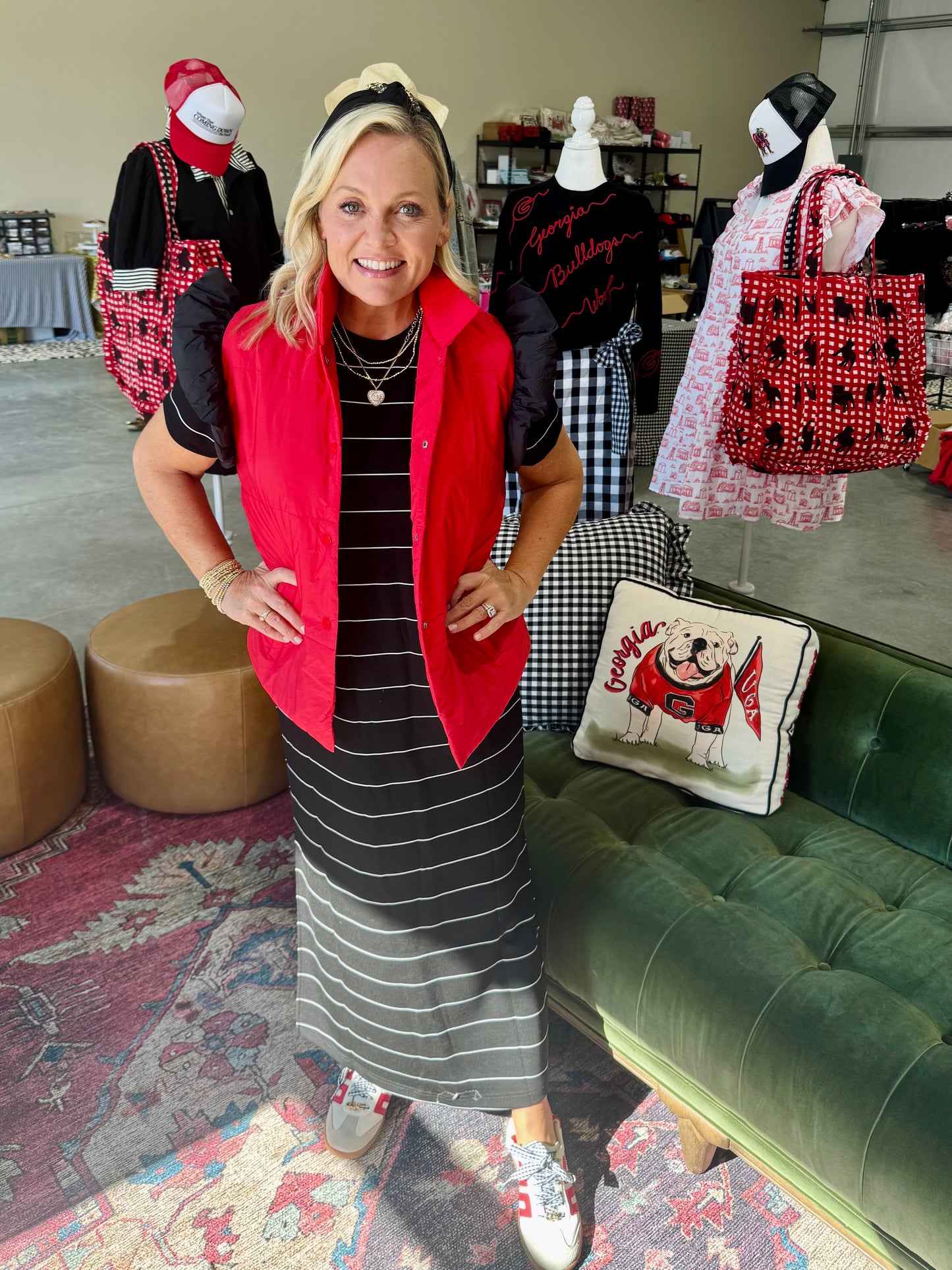 red puffer vest with black ruffle sleeves