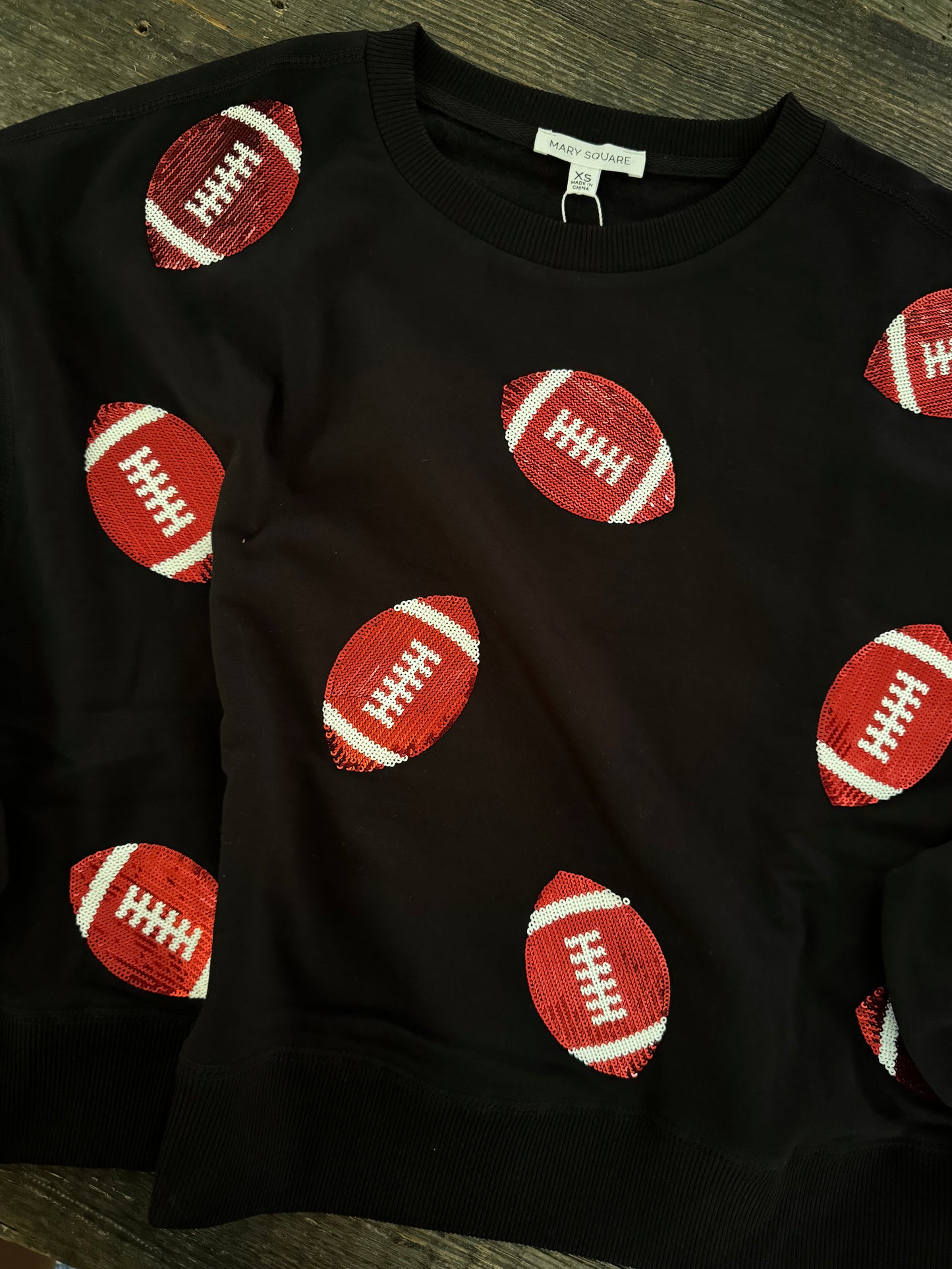 Luxury boutique sweatshirt football sequin UGA fall collection marked down