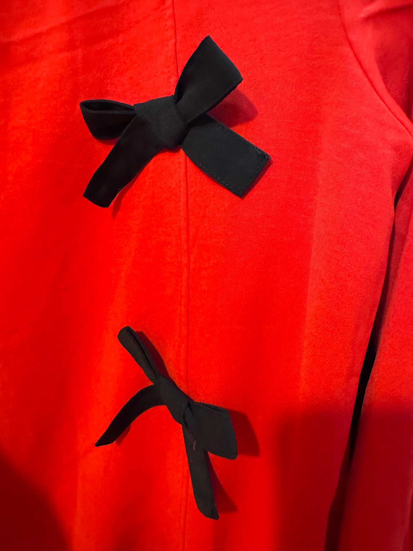 Red dress black bows marked down