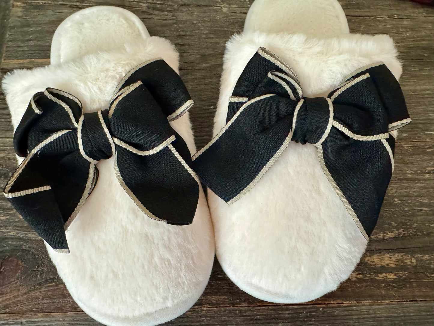 Cozy cream slippers black bow goes great with pajamas!