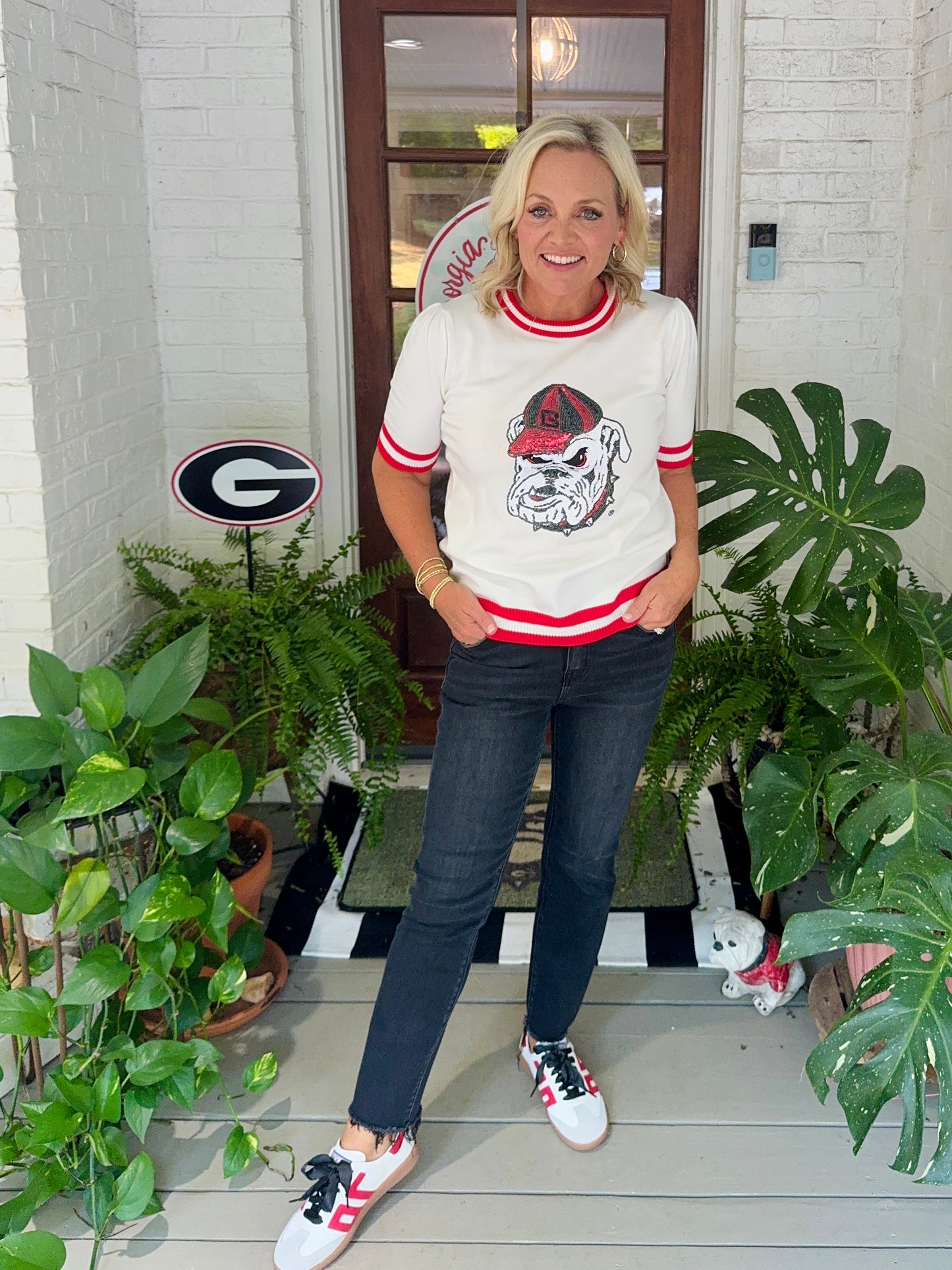 Varsity light weight knit sweater with stripe neckline sequin bulldog