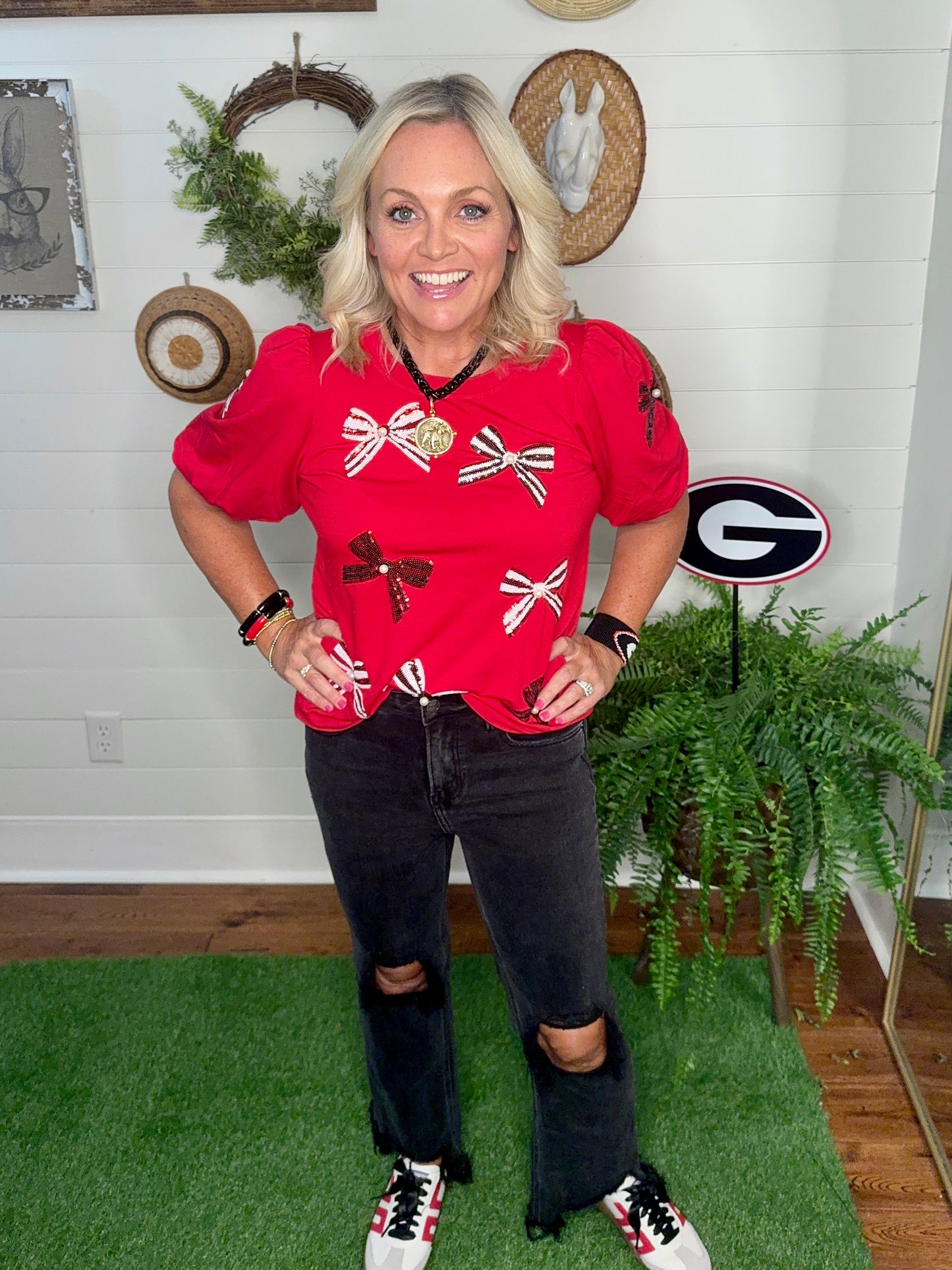 New red top with sparkle bows black and white