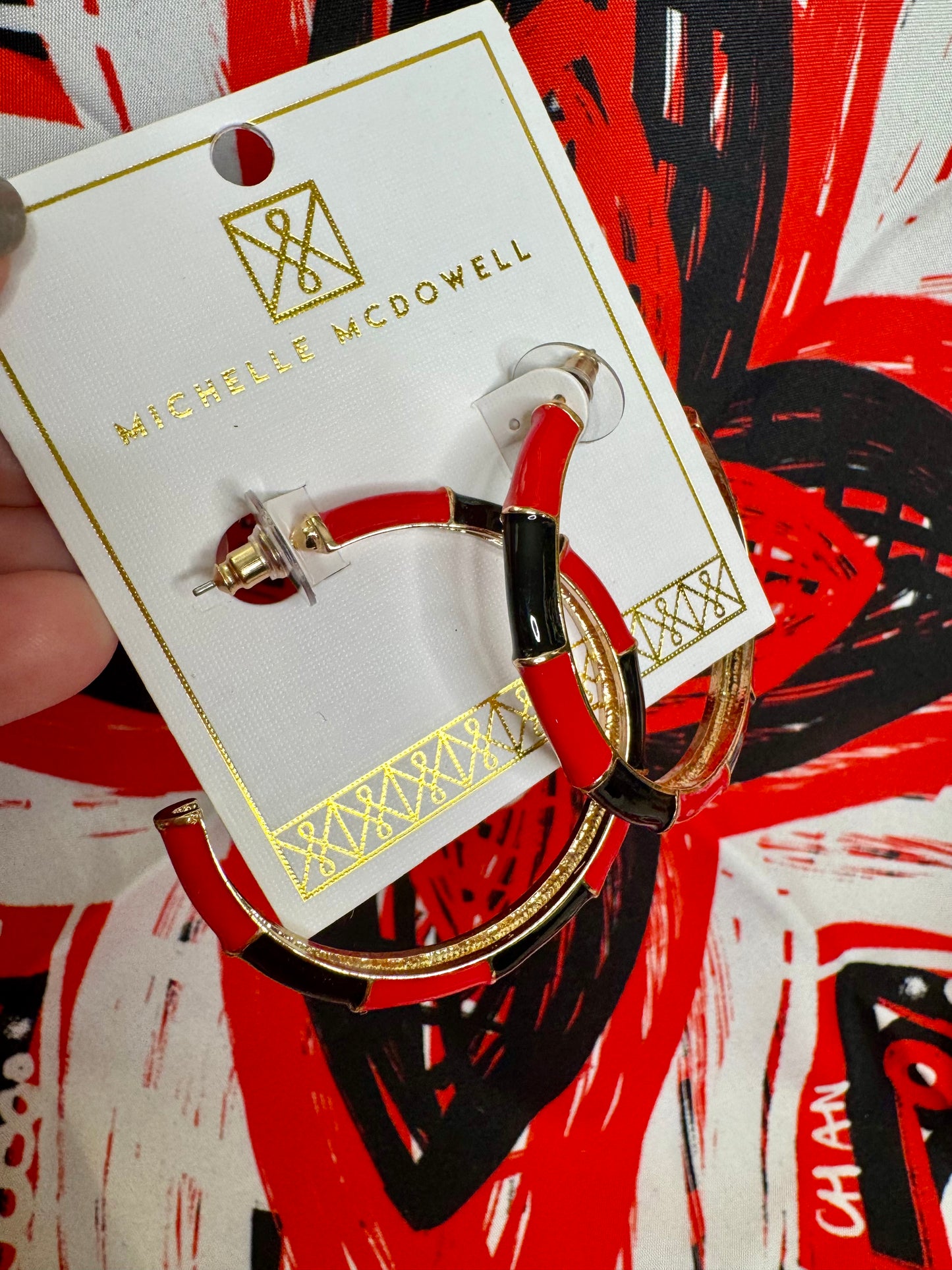 Med size gold metal black and red hoops