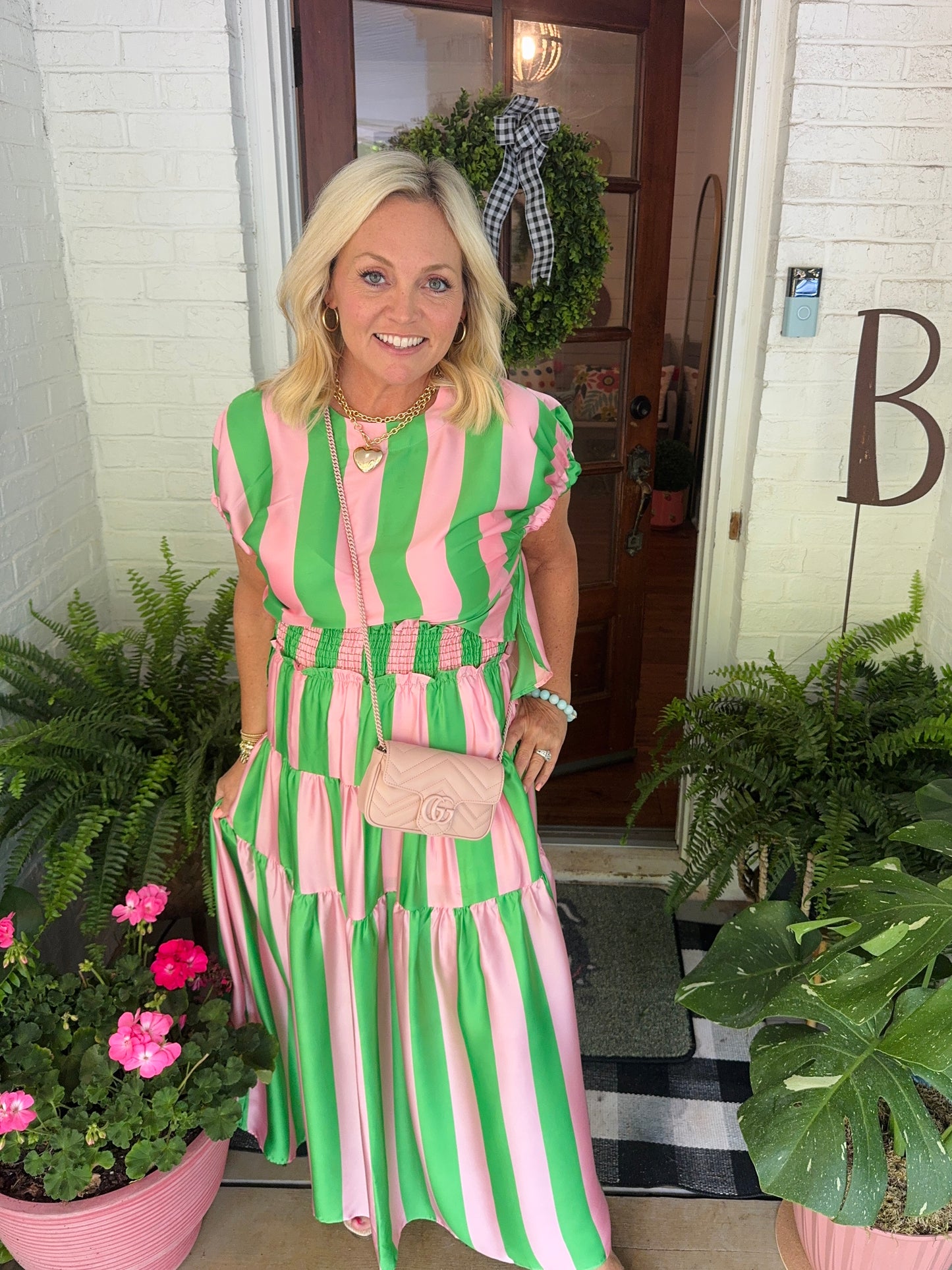 Summer green and pink striped top marked down