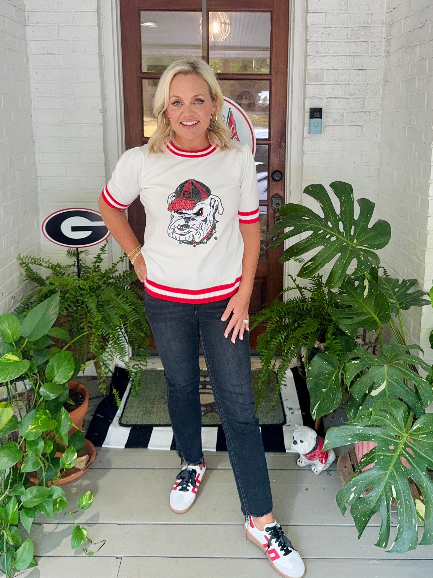 Varsity light weight knit sweater with stripe neckline sequin bulldog