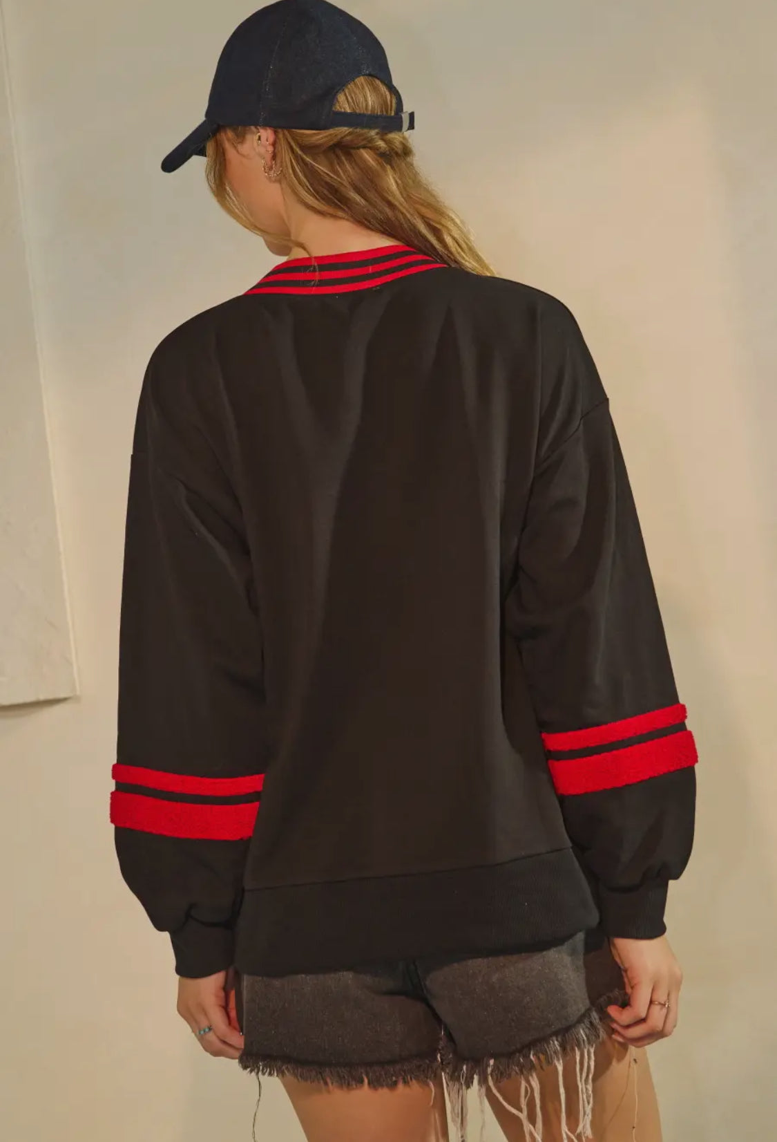Black pullover with Giant red fuzzy G