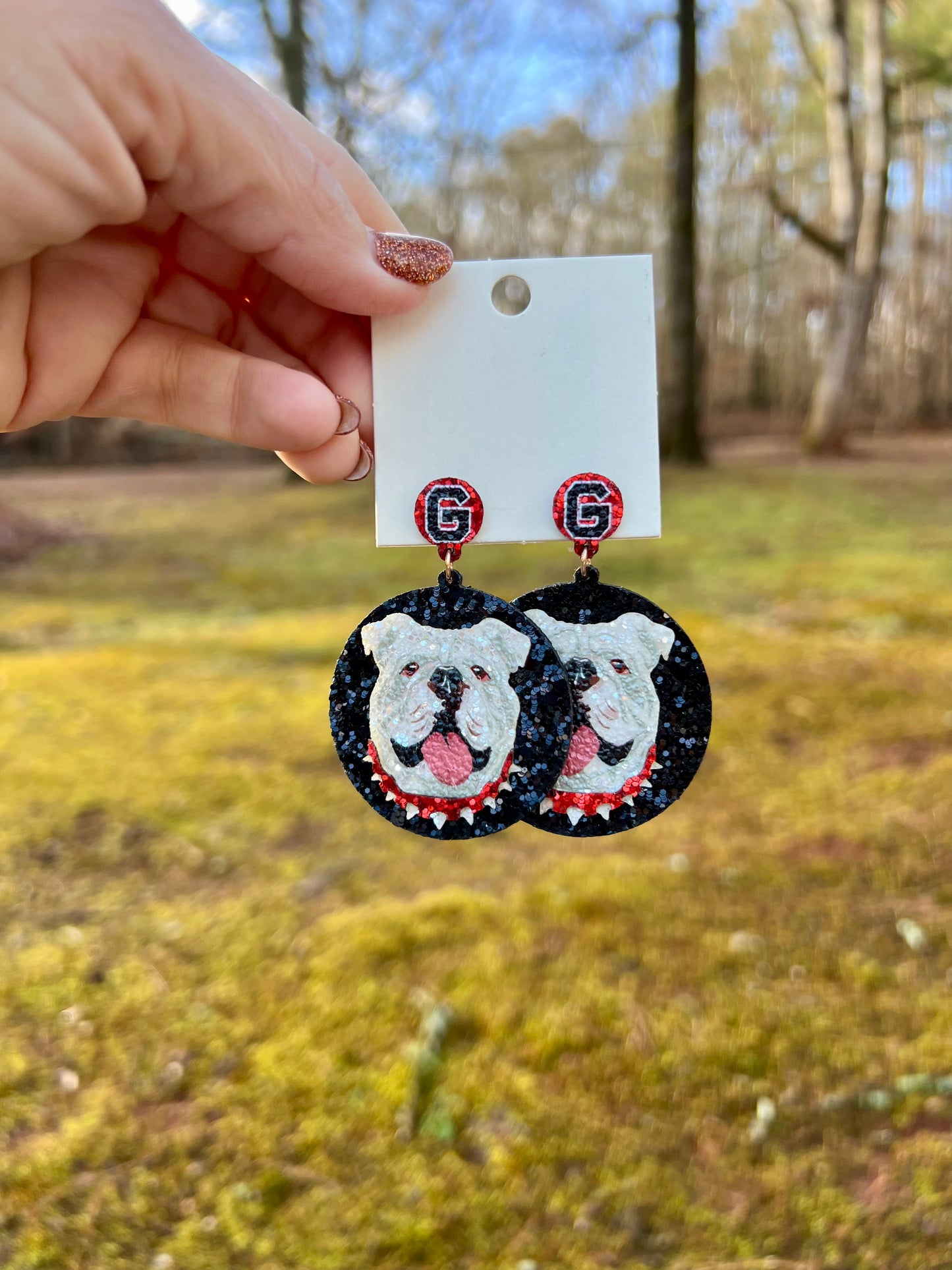 Black background dog earrings sparkly