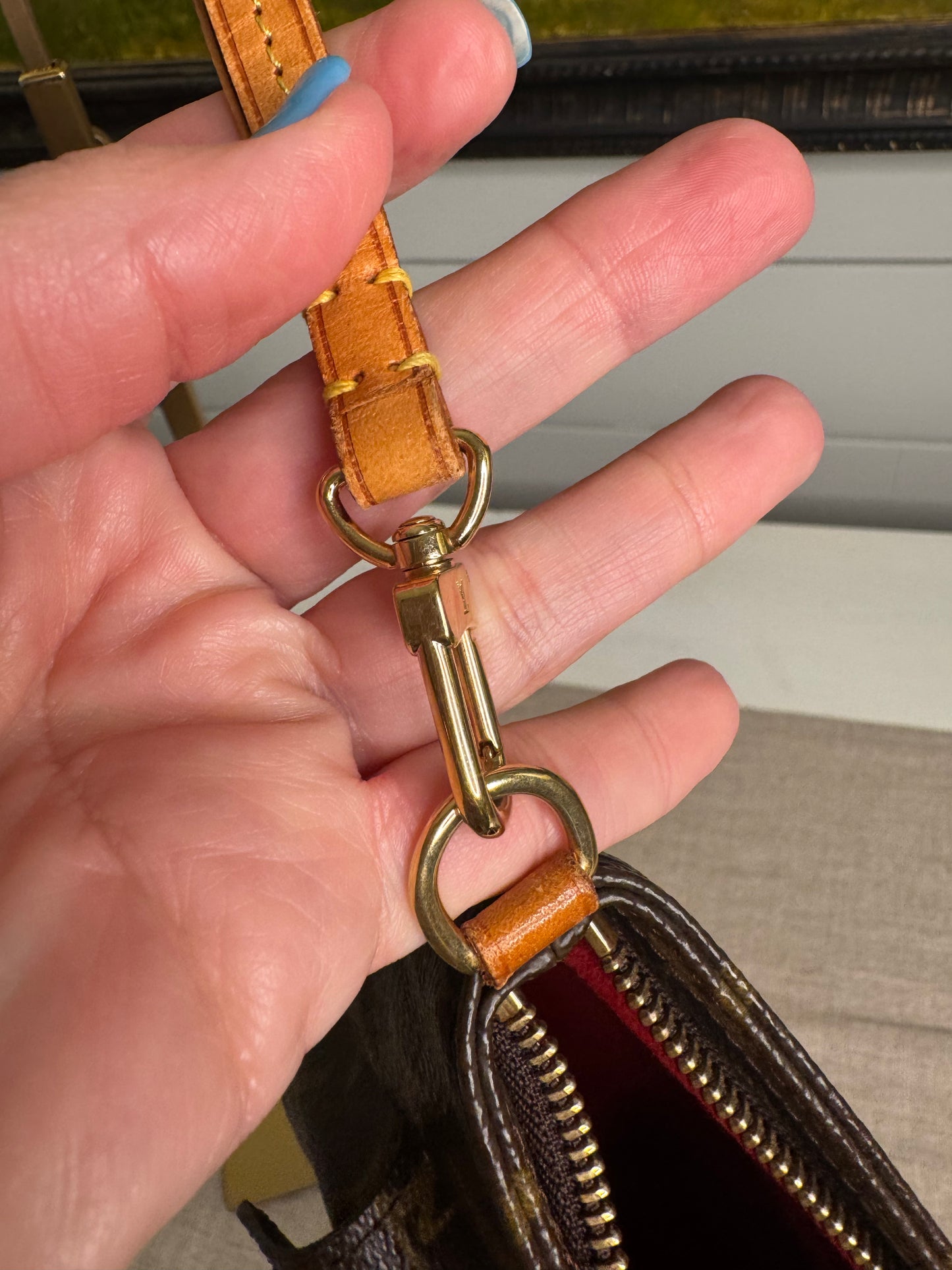Louis Vuitton partition pre loved monogram wristlet
