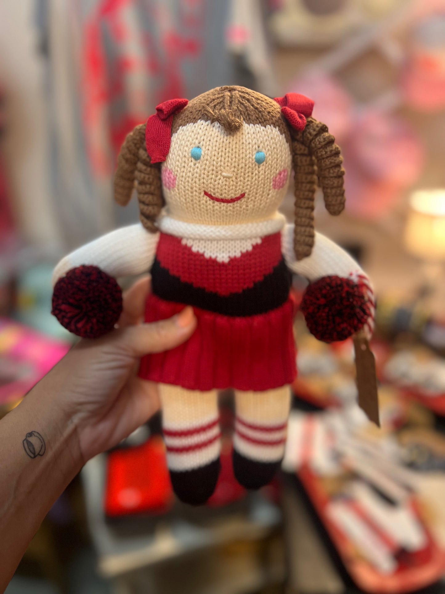 Handmade knit cheerleader doll