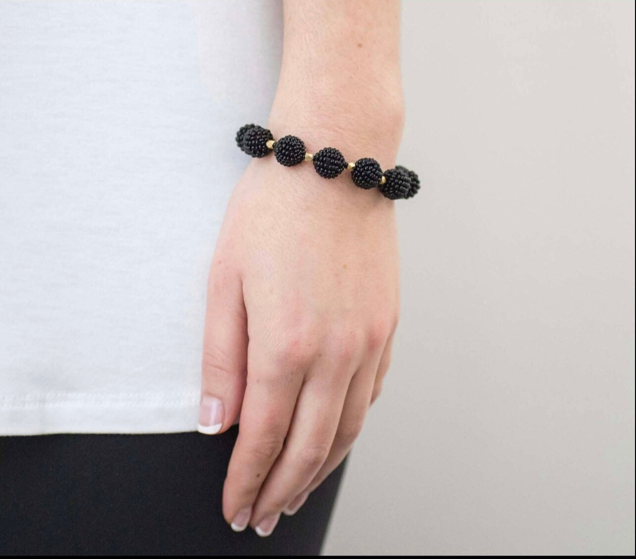 Roll on aid trade beaded bracelet black