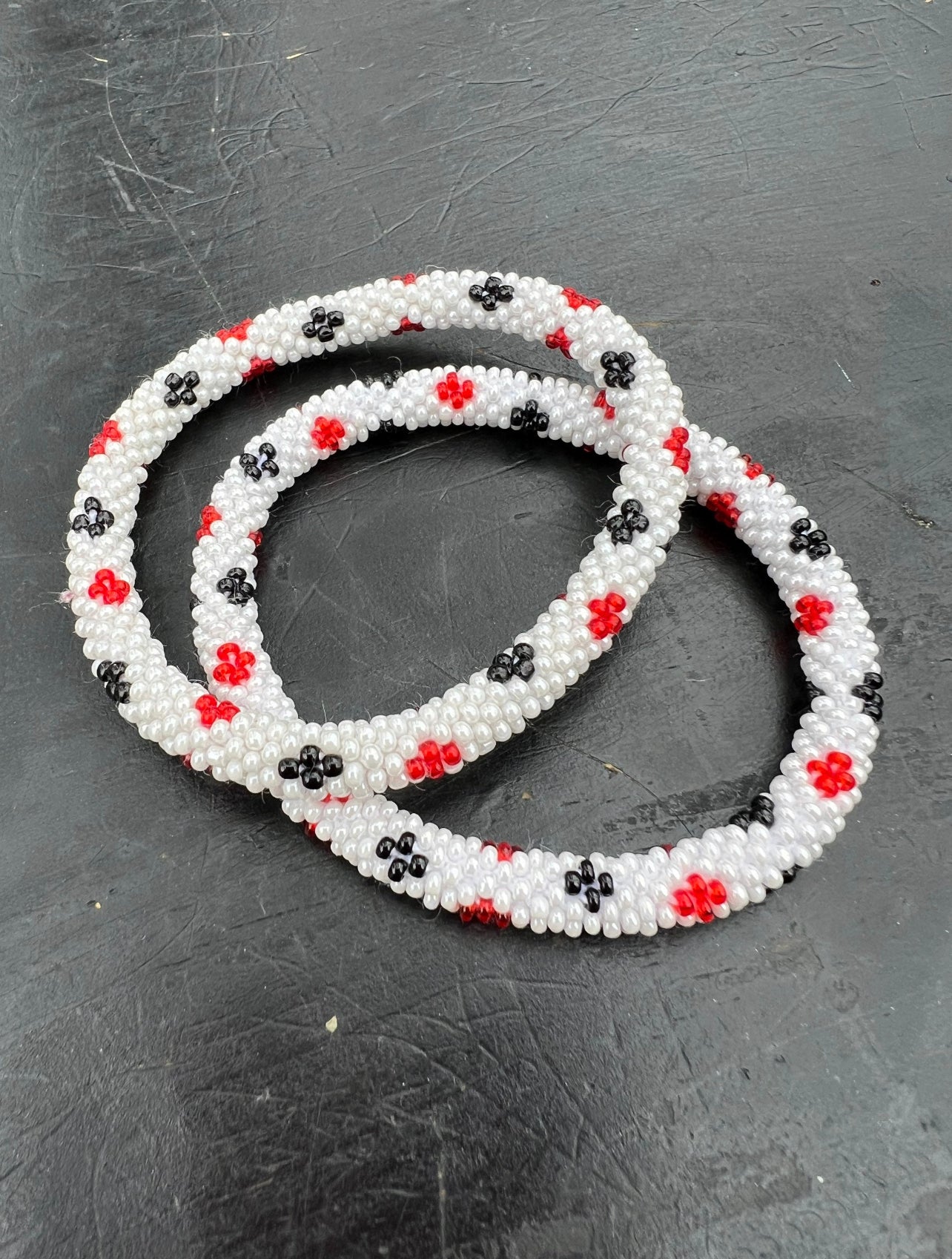 roll on aide trade beaded bracelet white