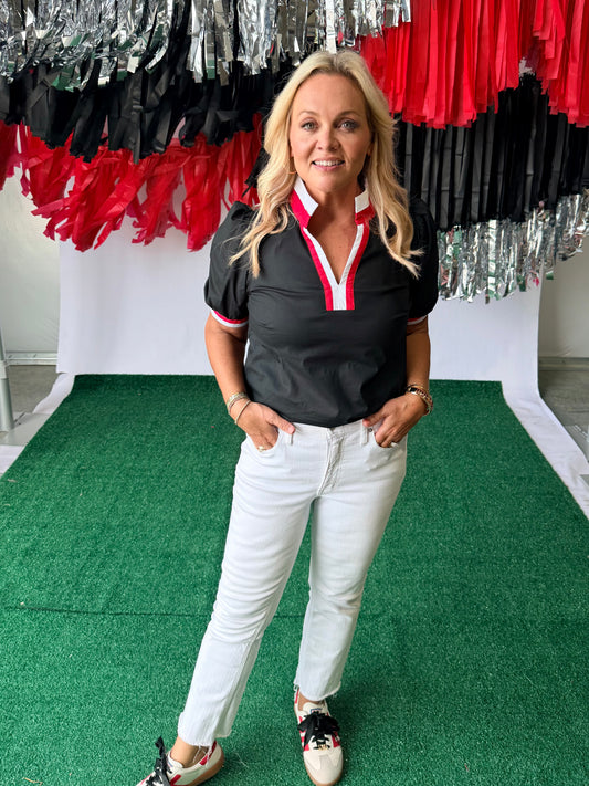 Black blouse with red and white trim