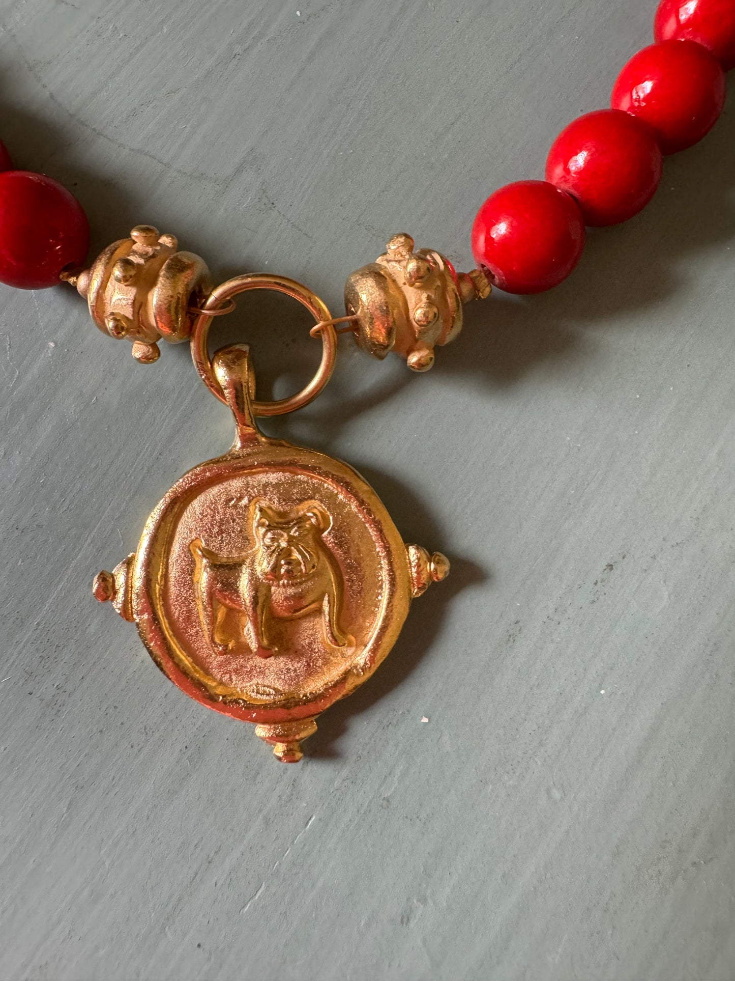 Susan Shaw Red coral gold bulldog medallion necklace