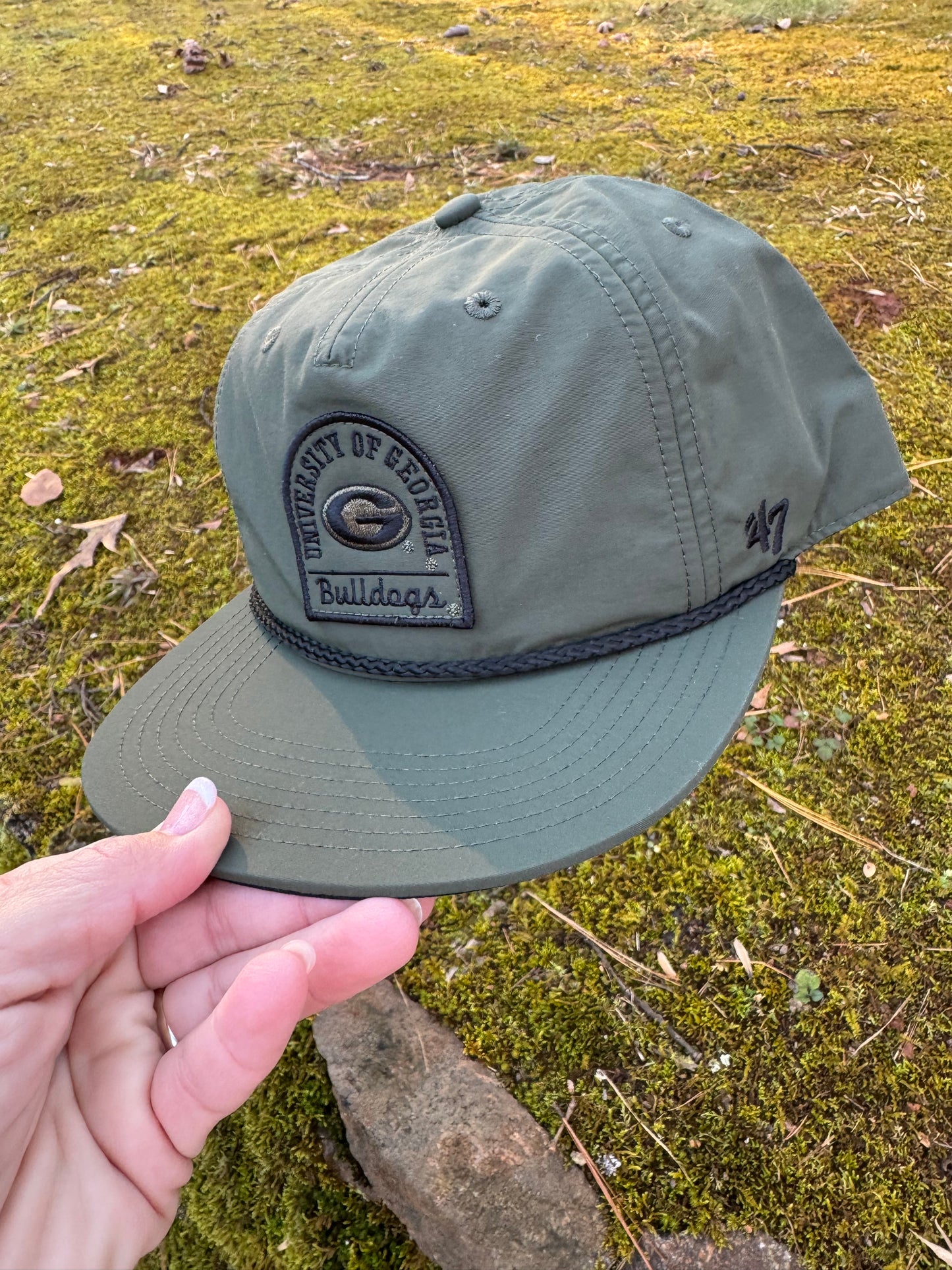 Olive green pier captain flat brim hat
