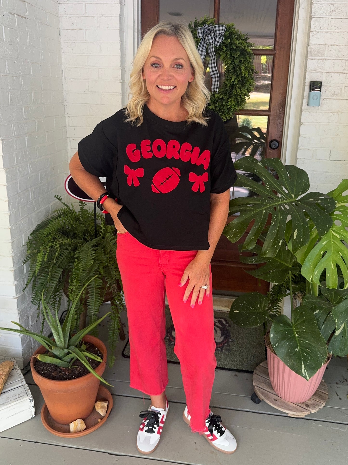 Oversized top slightly cropped black with red patches