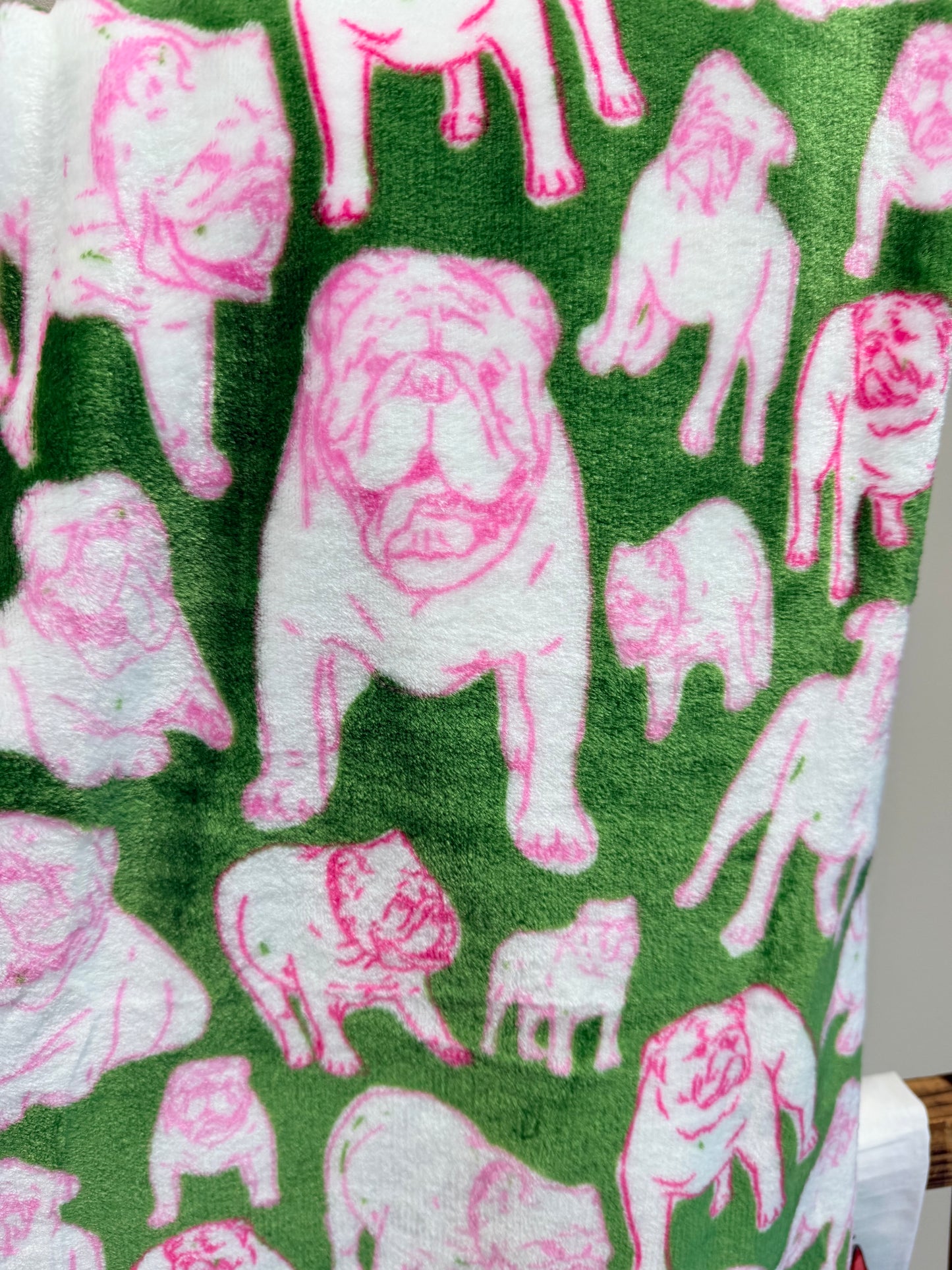 Pink and green bulldog throw