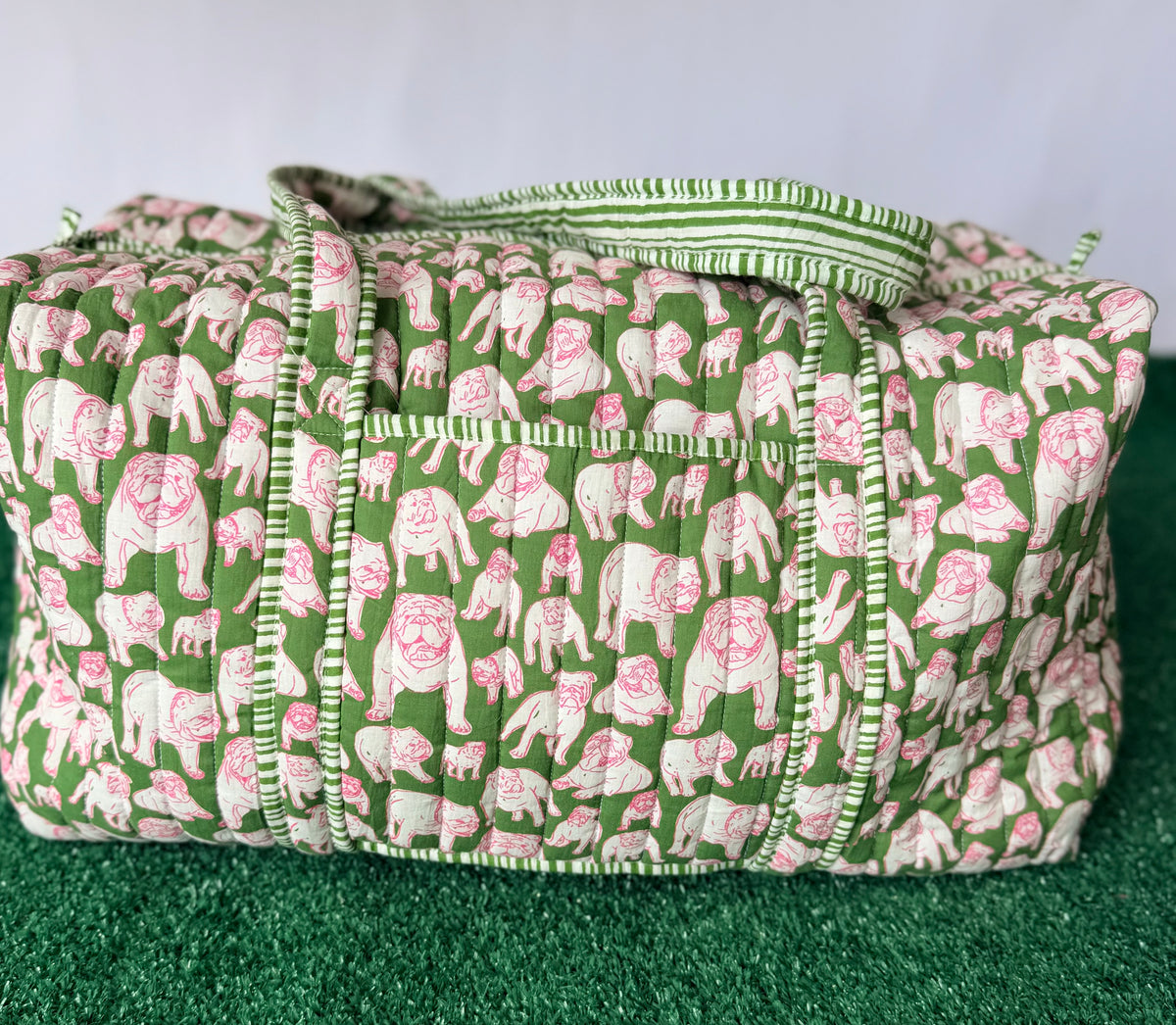 Green and pink quilted bulldog duffle