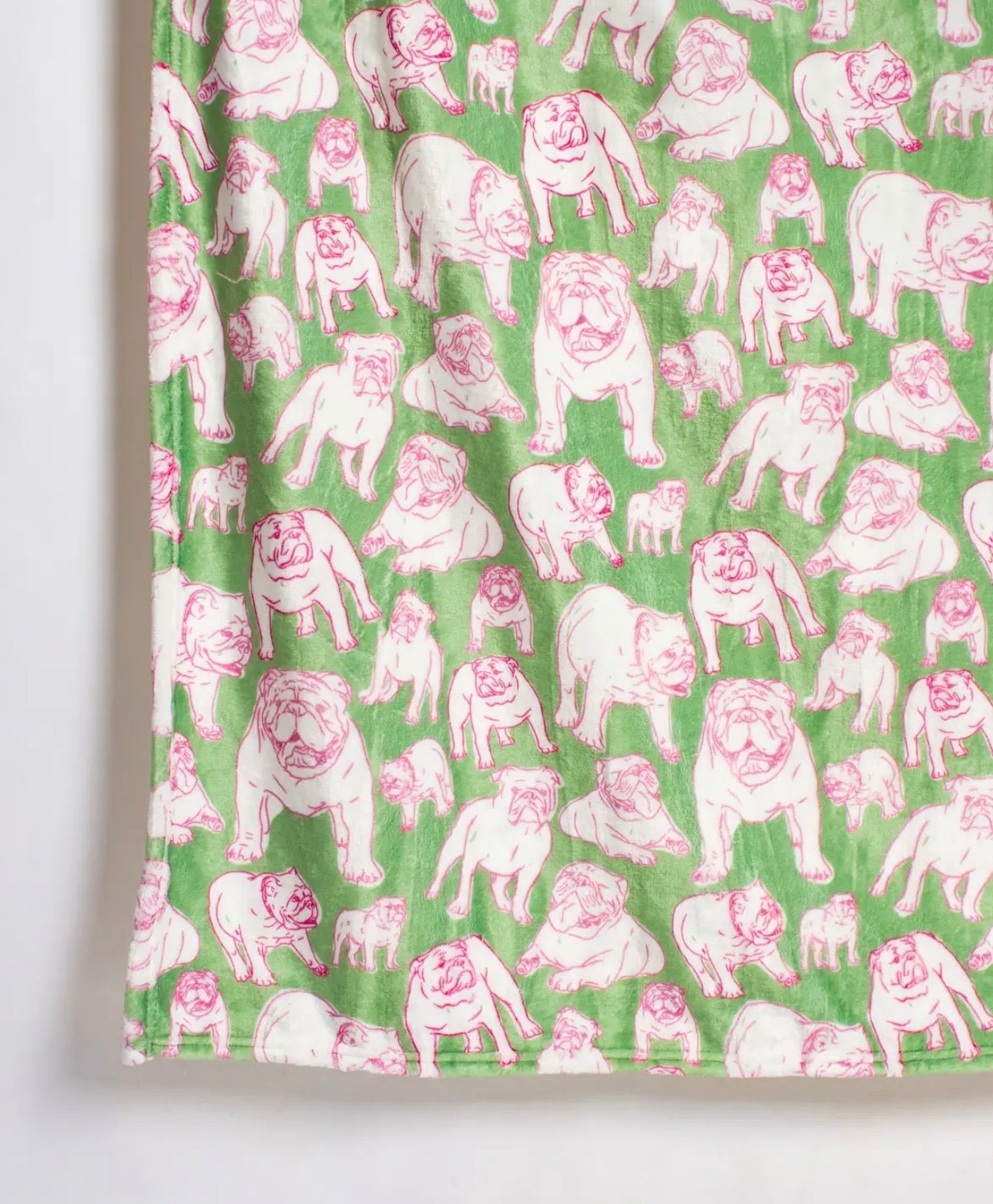 Pink and green bulldog throw