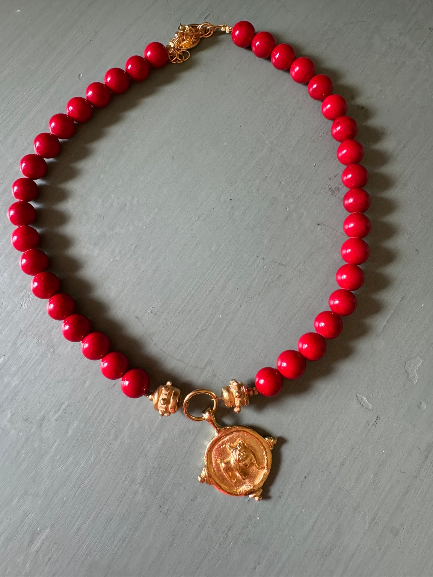 Susan Shaw Red coral gold bulldog medallion necklace