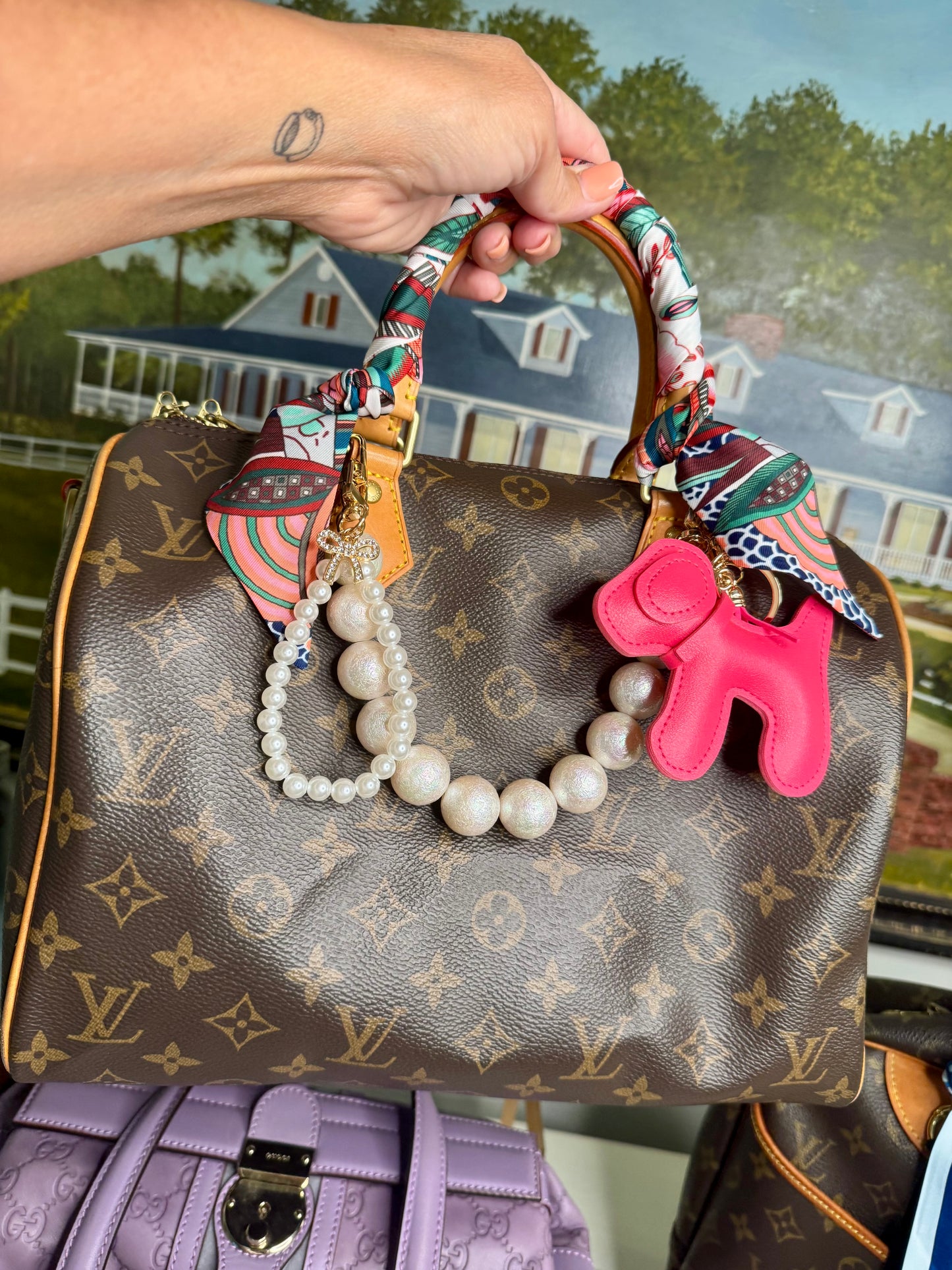 Pink dog purse charm key chain with tassel