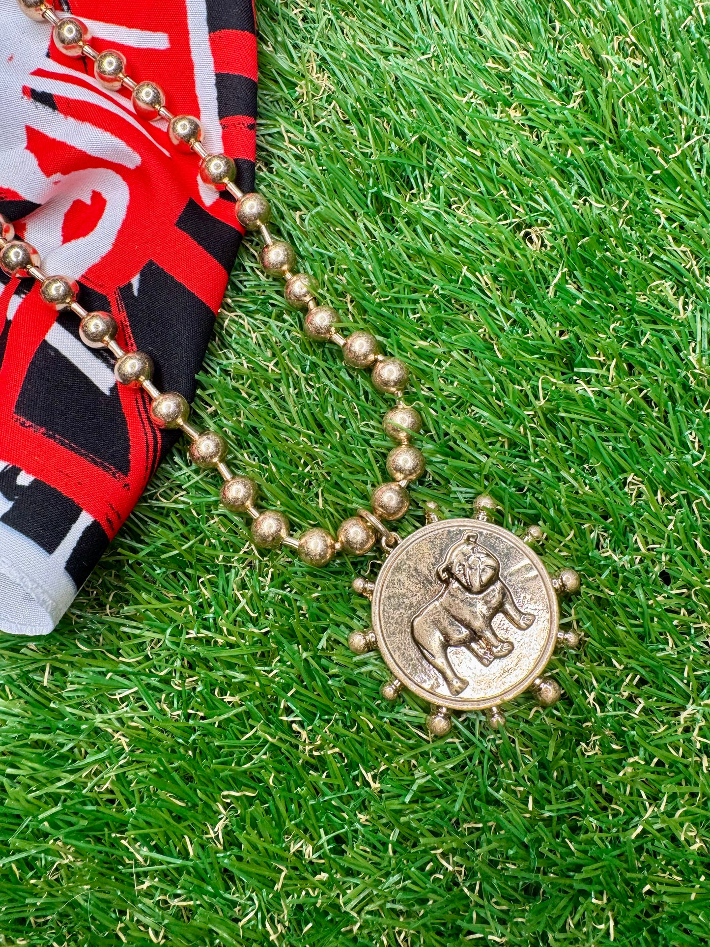 Metal gold necklace with dog medallion