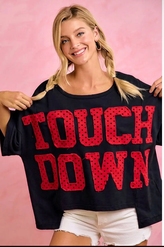Touch down oversized black top
