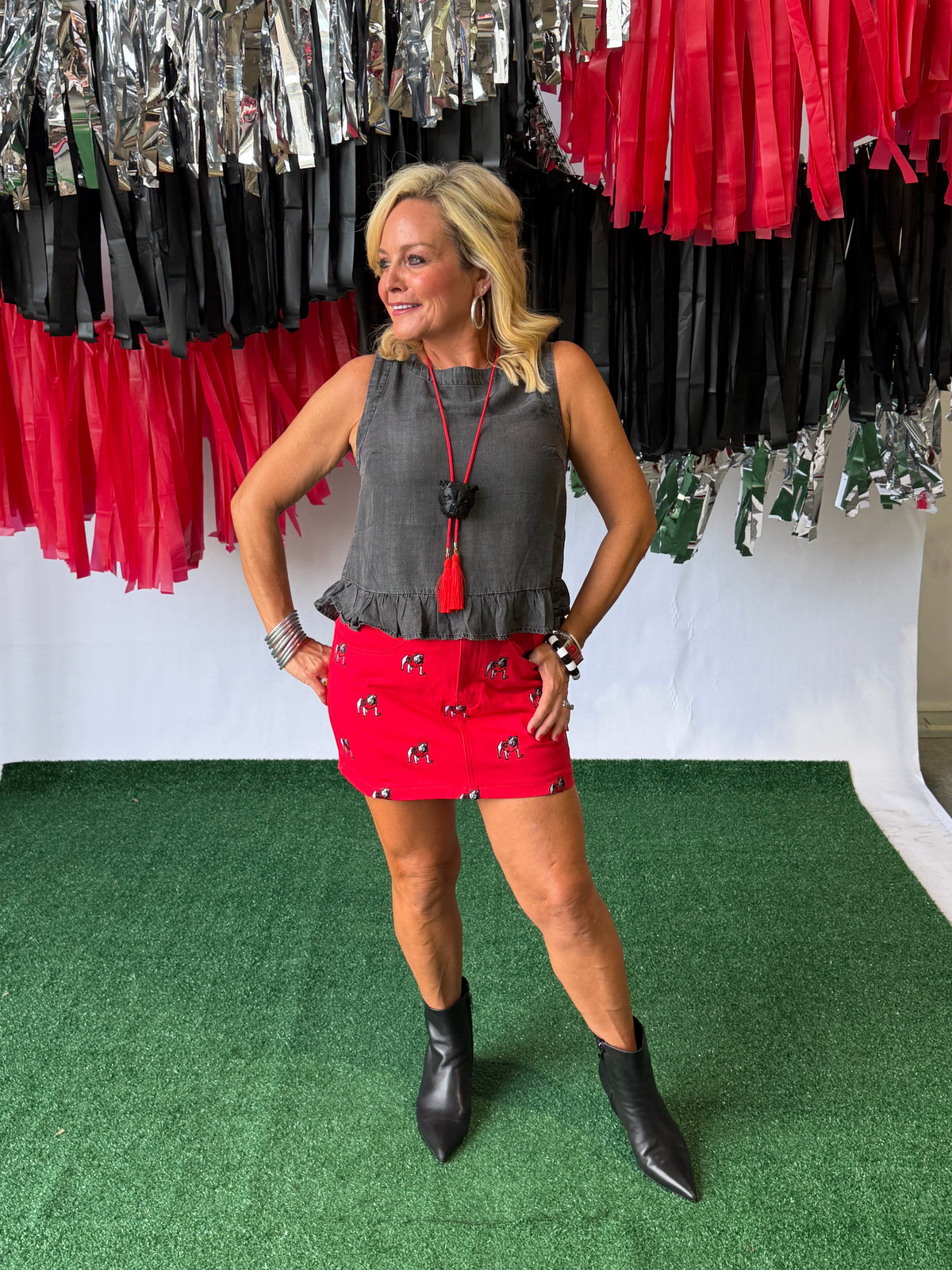 Black charcoal sleeveless button back top