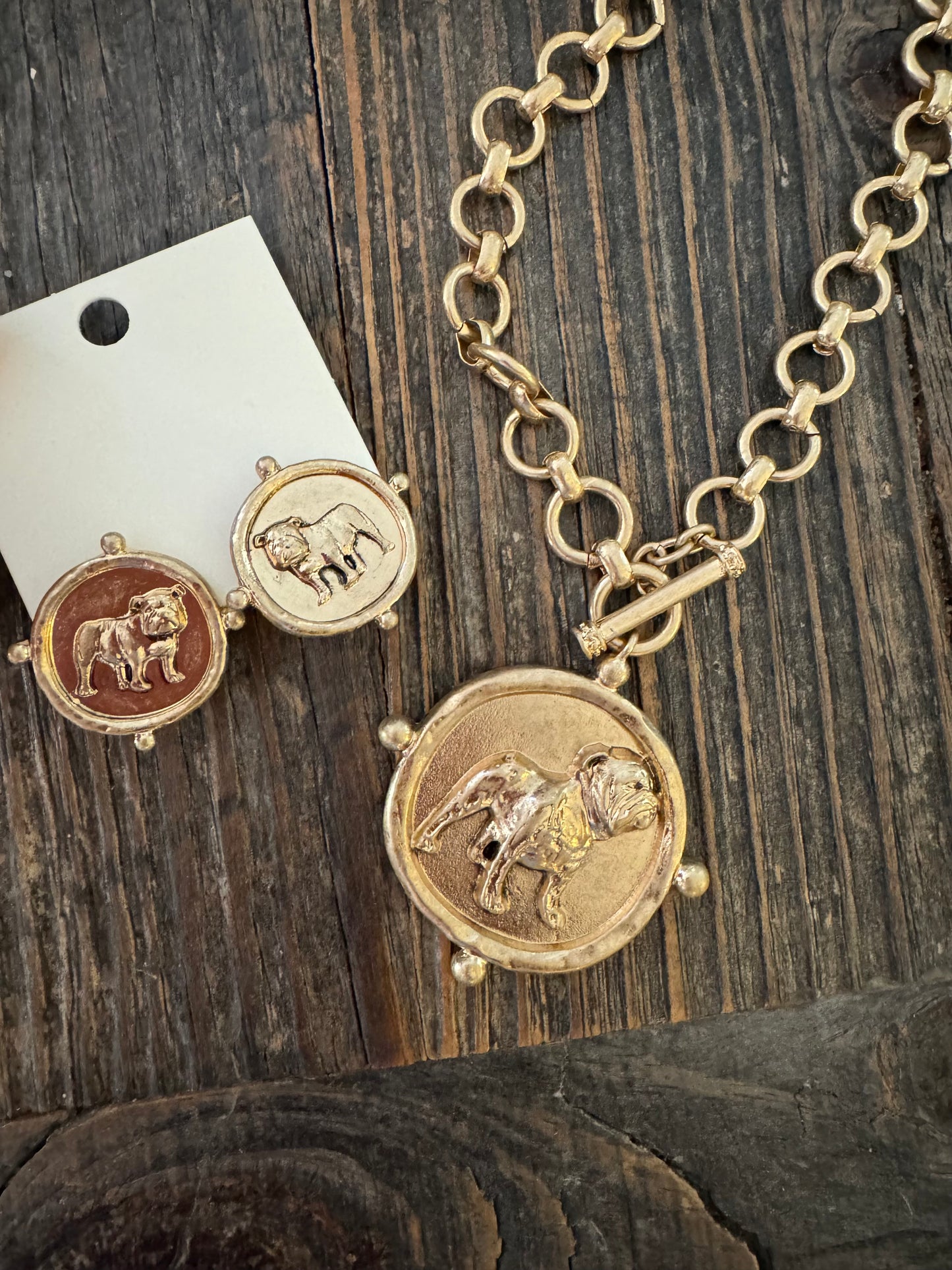 Standing dog medallion studs gold