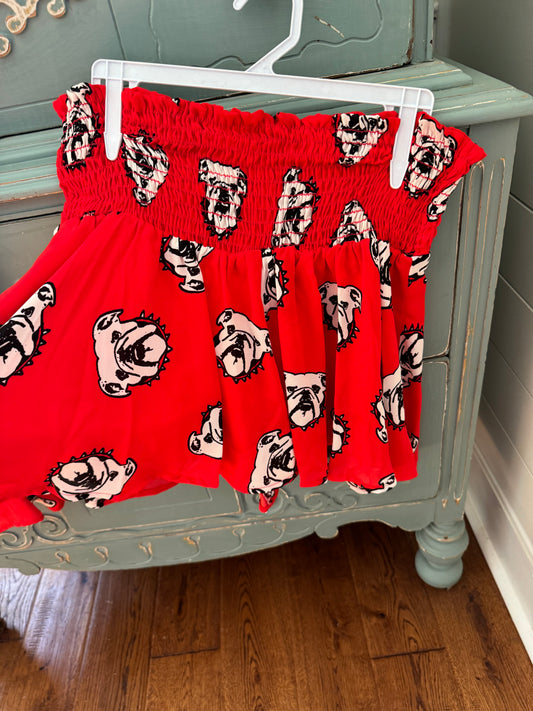 Red flowy shorts dog