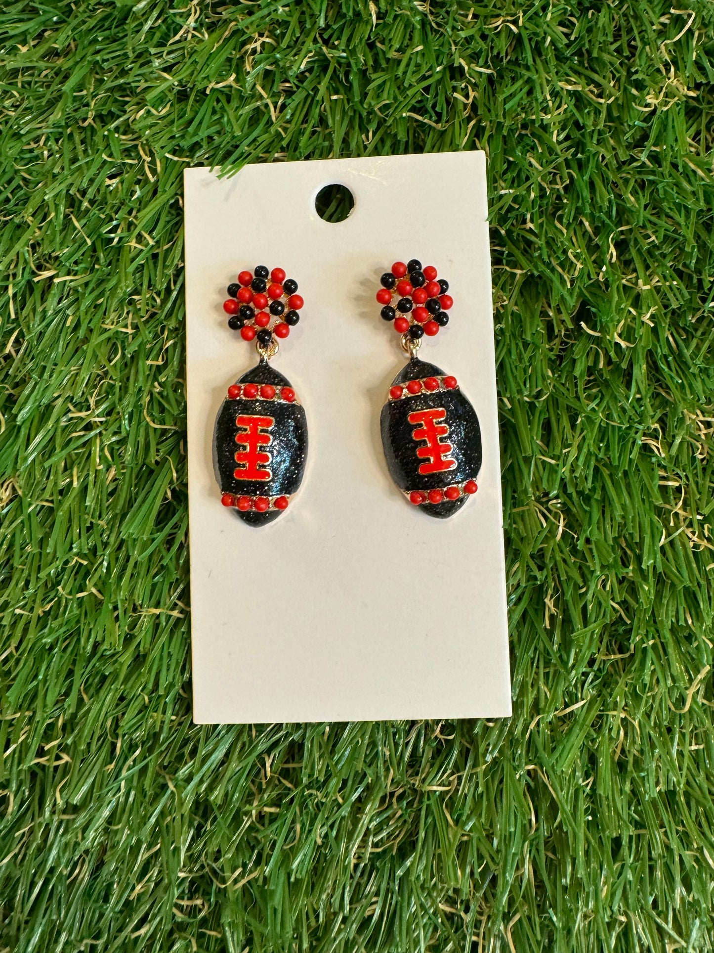 Red and black football drop earrings