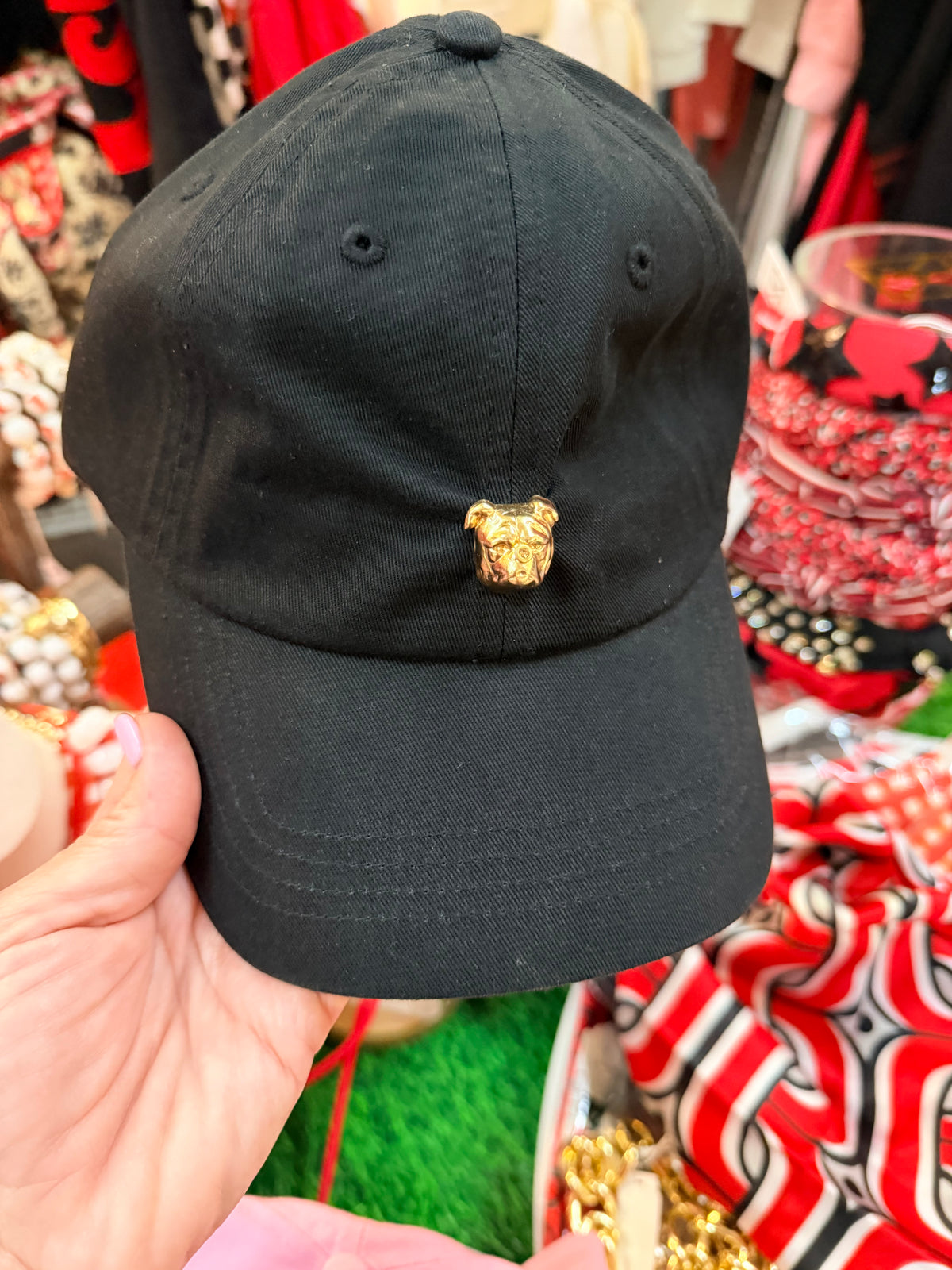 Black hat with gold bulldog