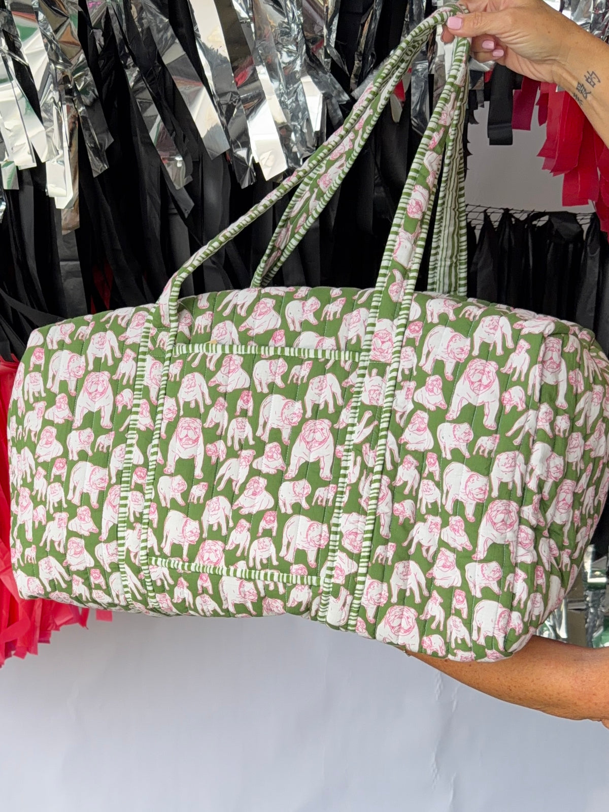 Green and pink quilted bulldog duffle