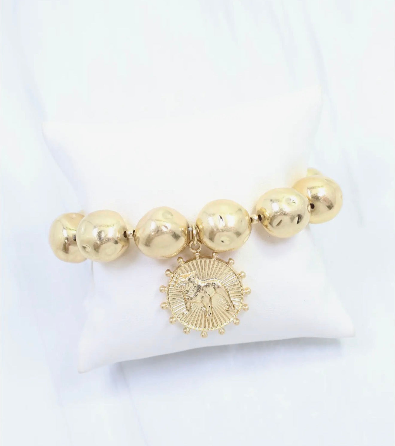 Giant worn gold stretchy bracelet bulldog