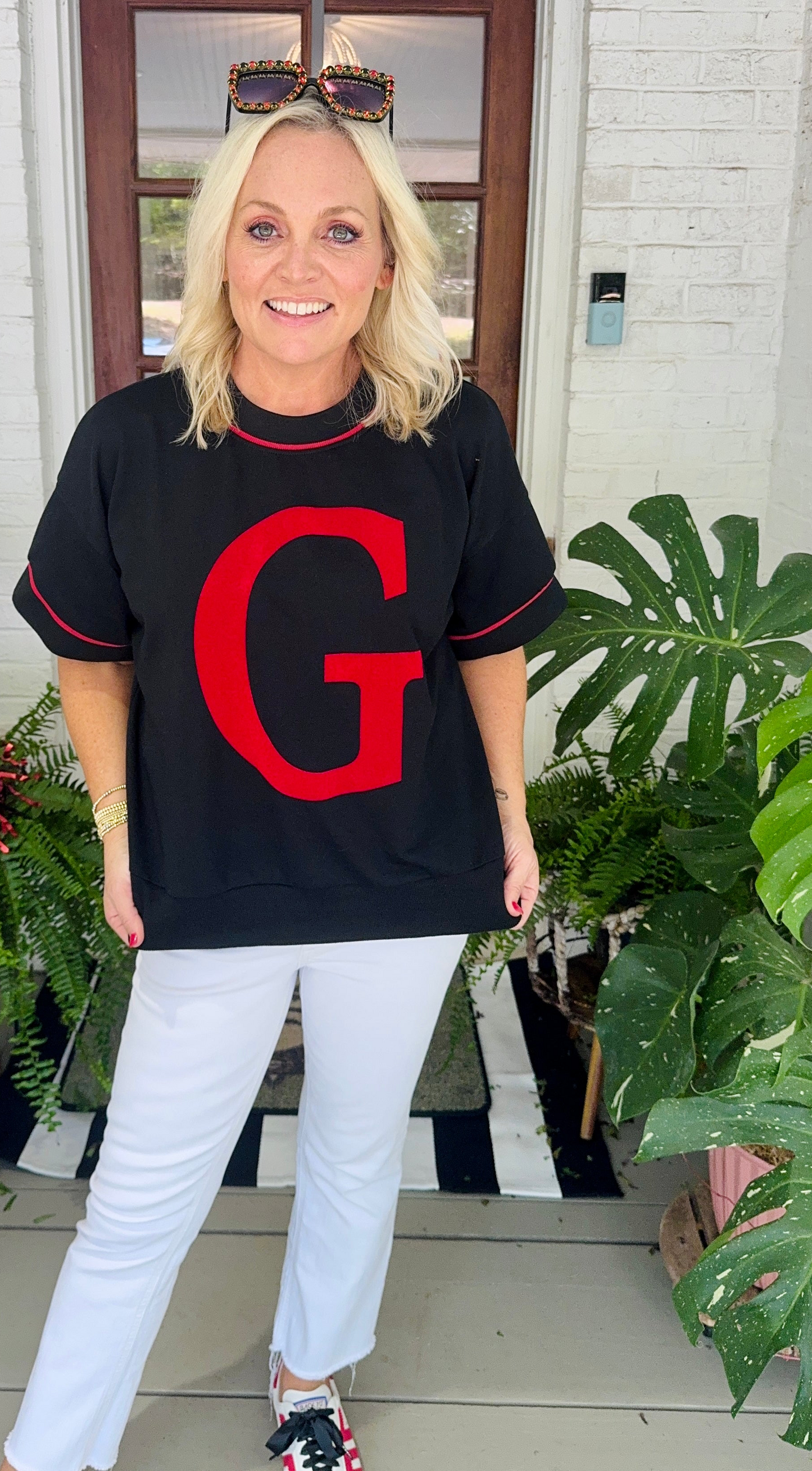 Boxy light sweatshirt type top with Giant G oversized. I have plus size too!