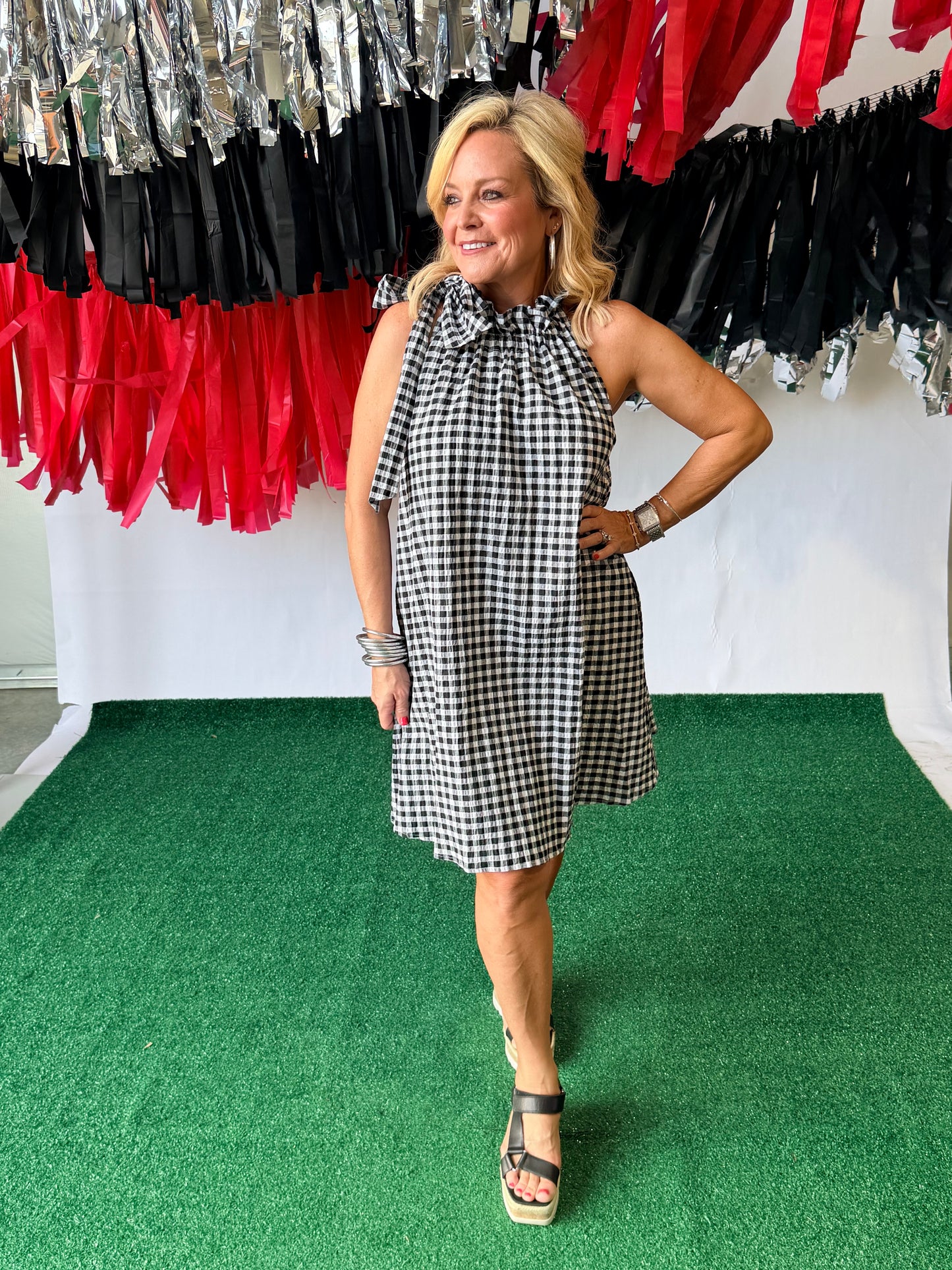 Black and white gingham swing dress with bow
