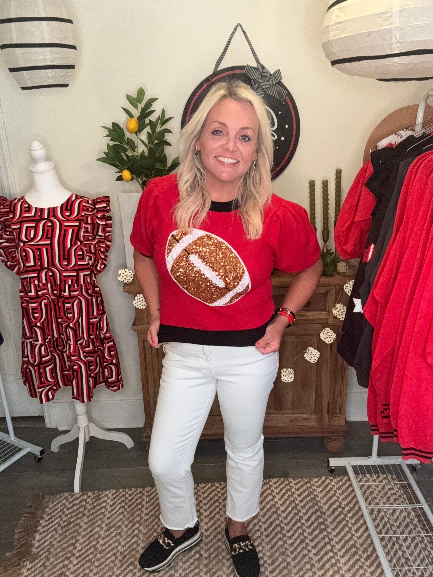 Red and black sweater sequin football