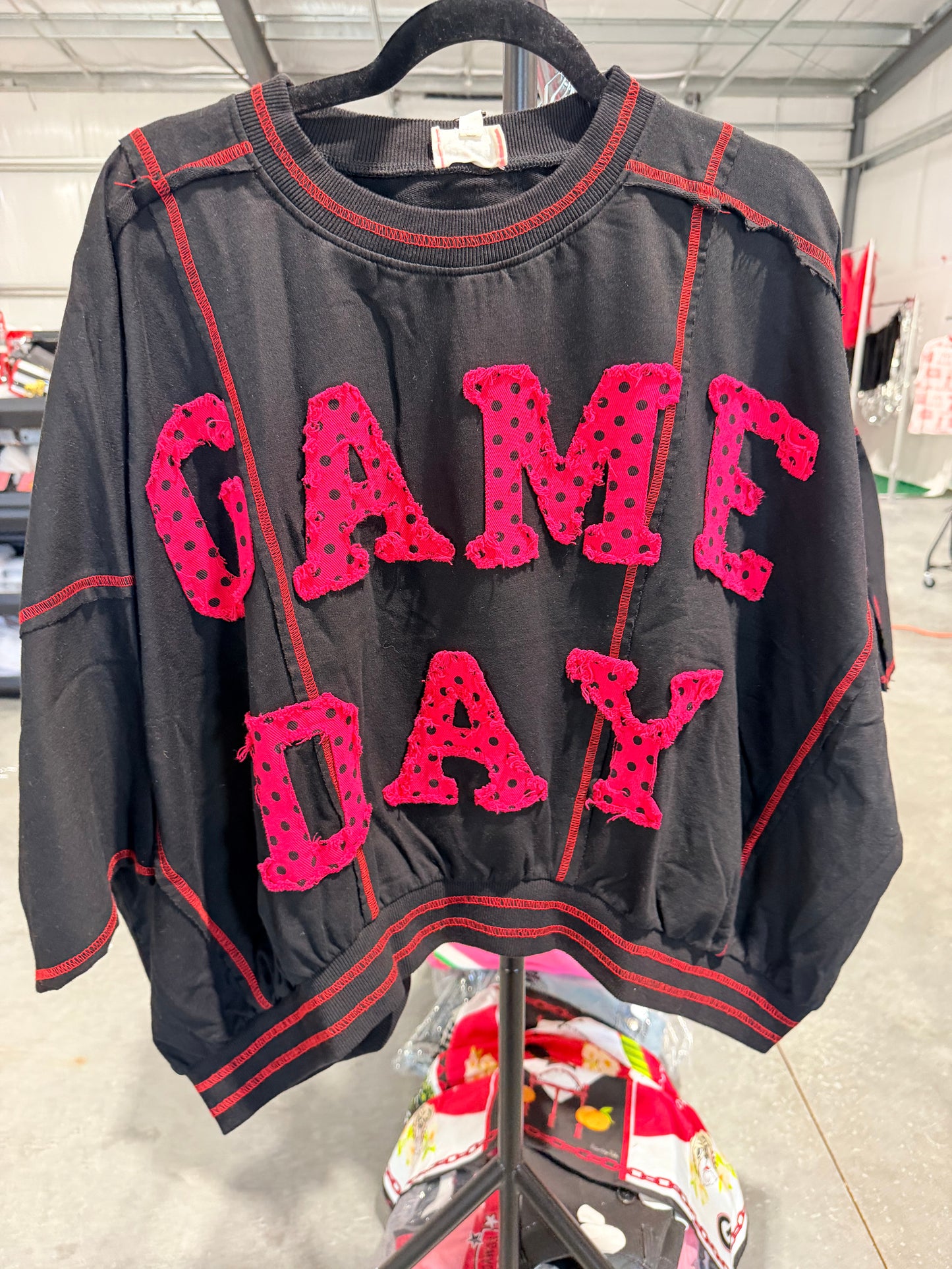 Game day oversized black top