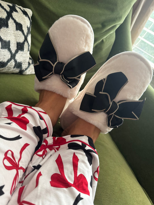 Cozy cream slippers black bow goes great with pajamas!