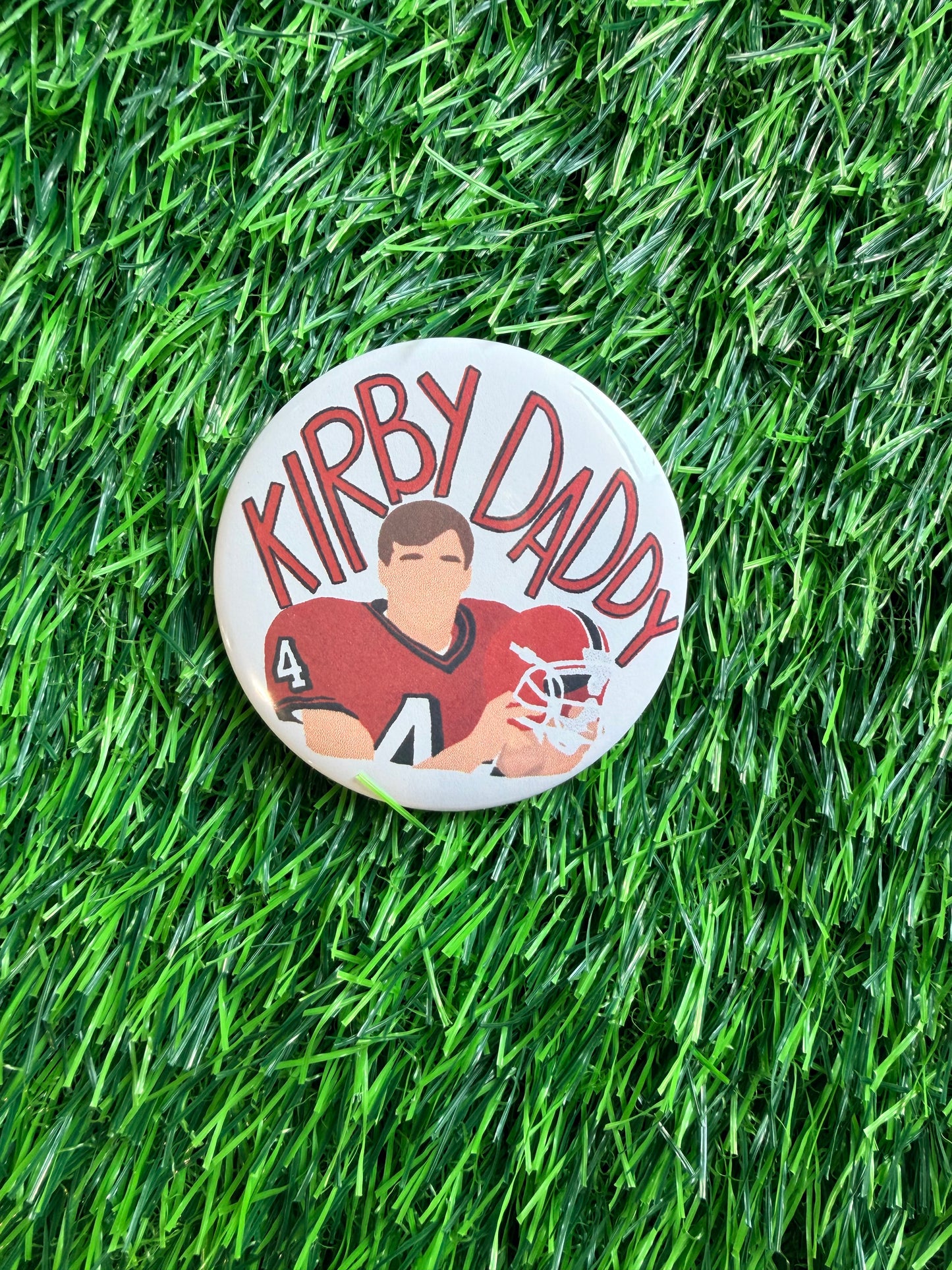 Game day button black and red football