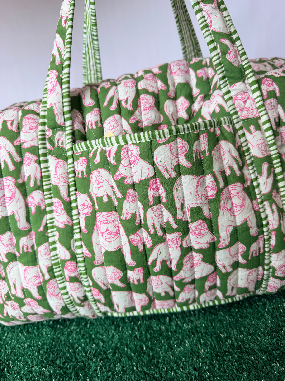 Green and pink quilted bulldog duffle