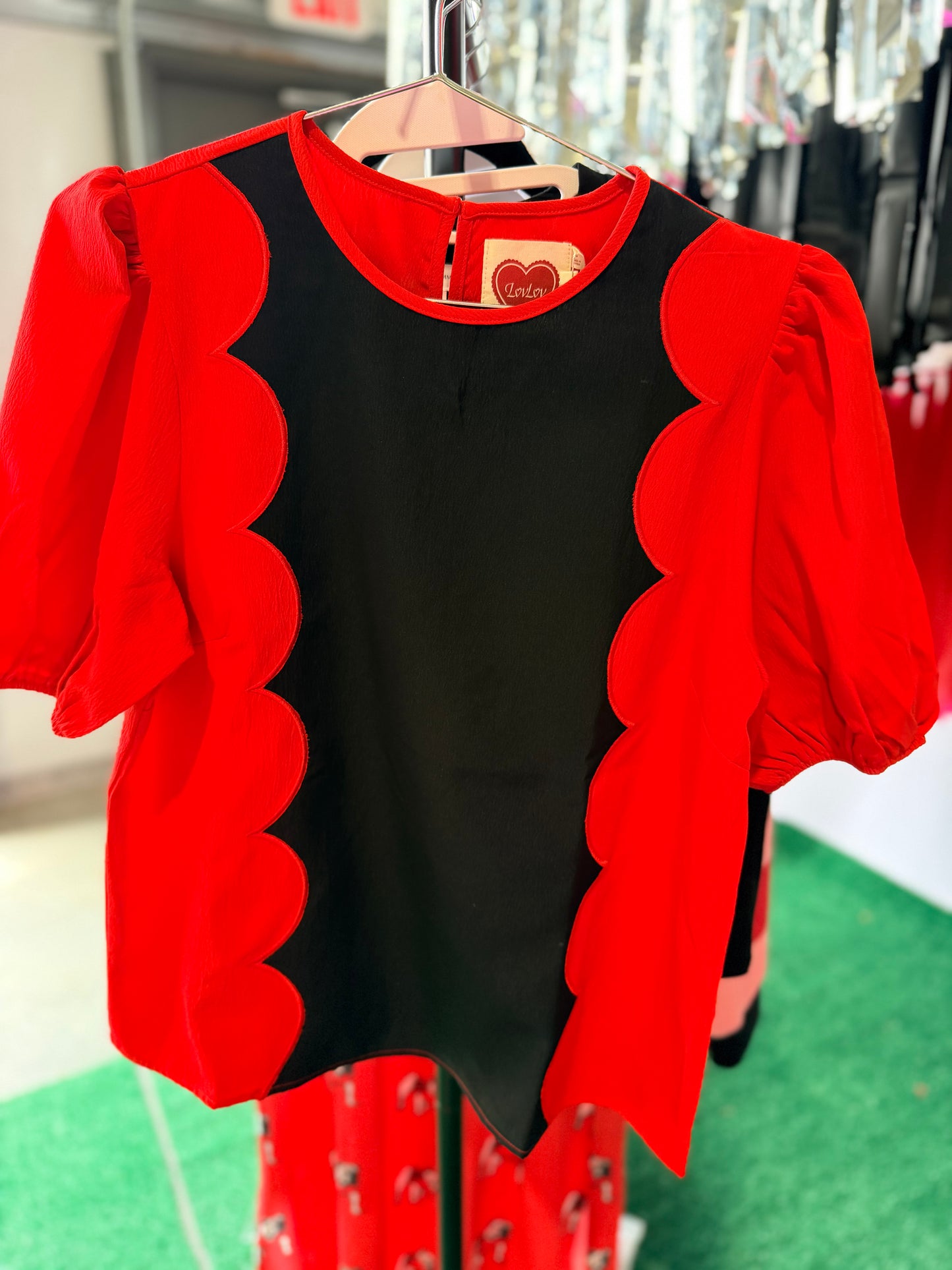 Wave scalloped black and red blouse