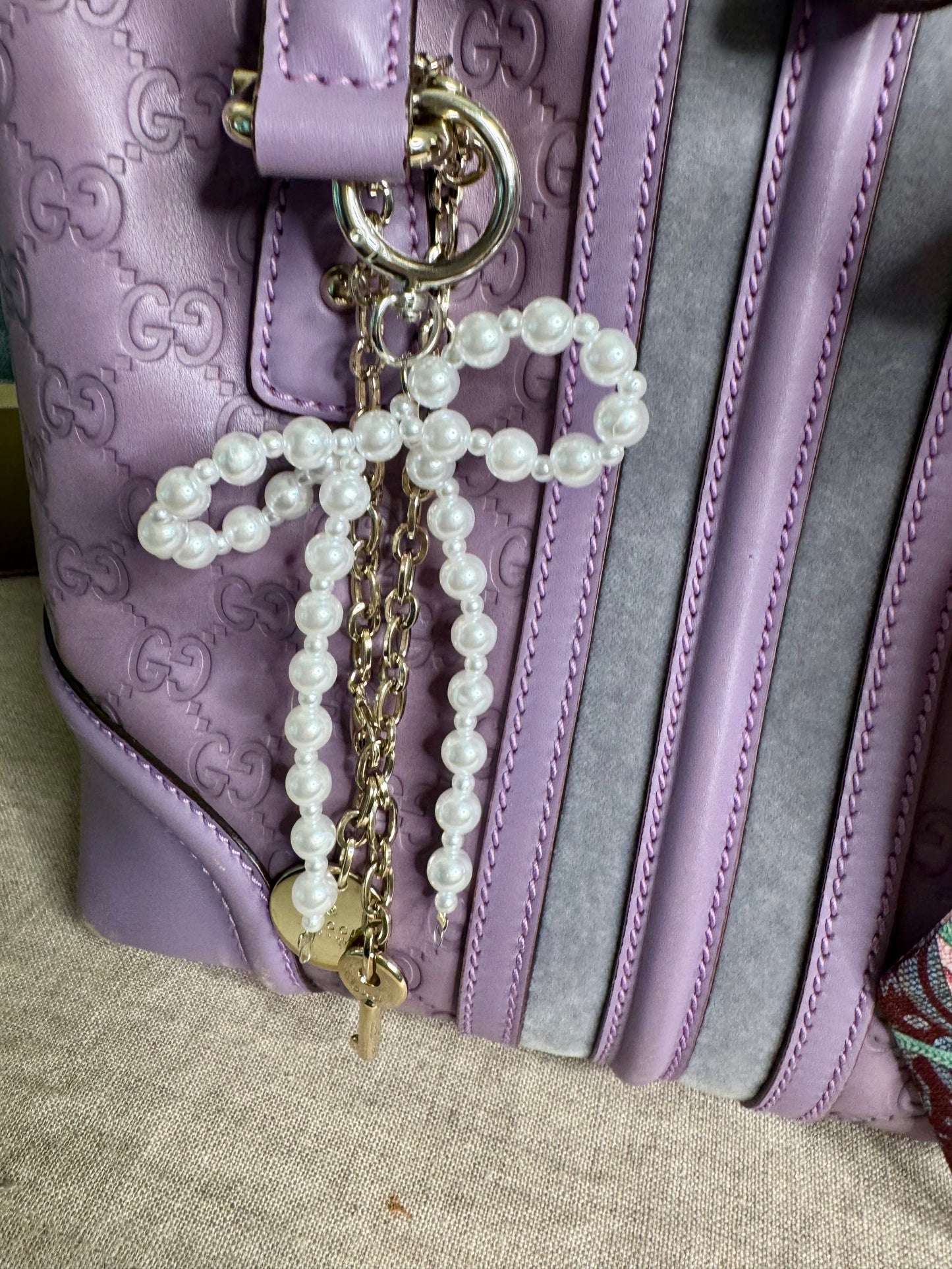 Pearl bow purse charm key chain gold  hardware