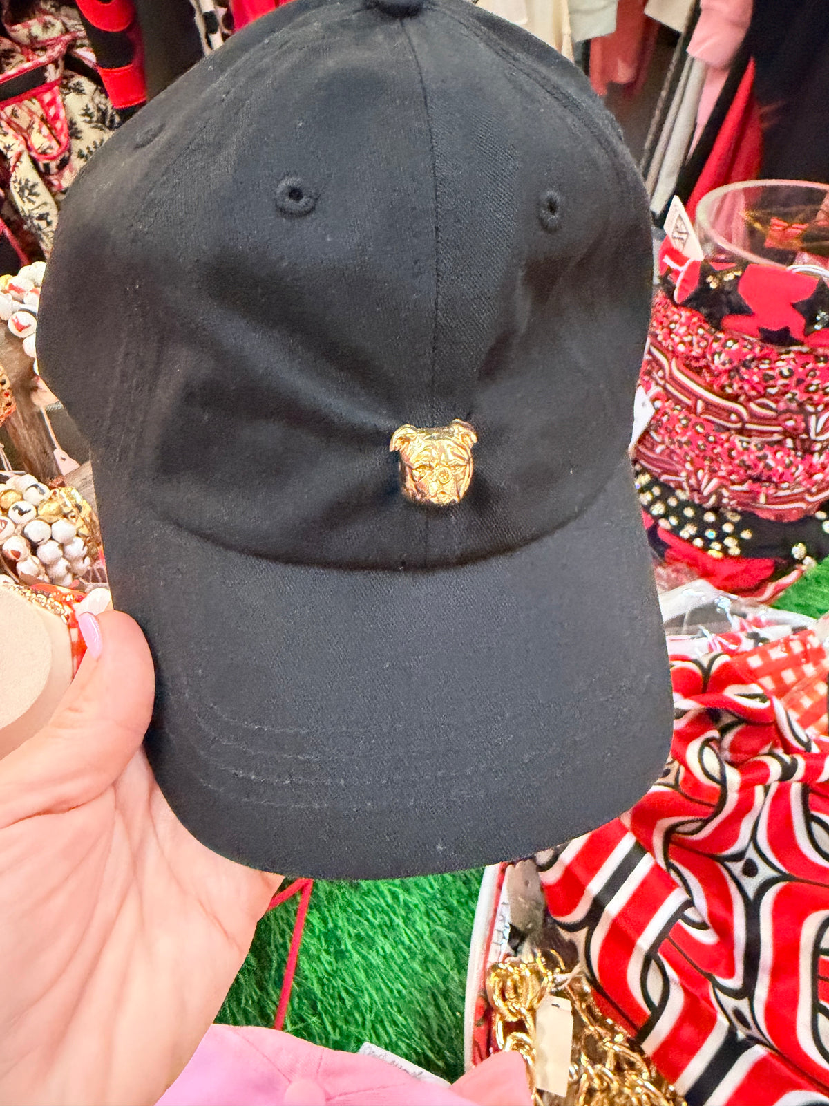 Black hat with gold bulldog