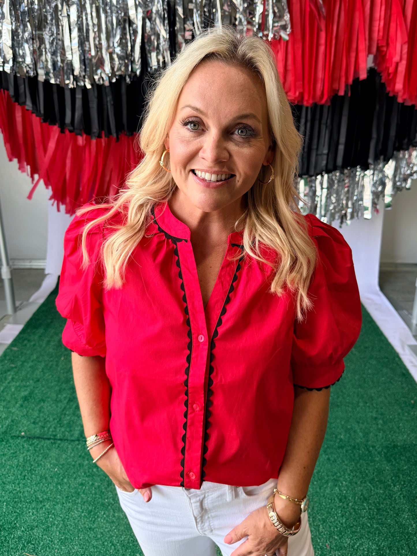 Red blouse with black pipping