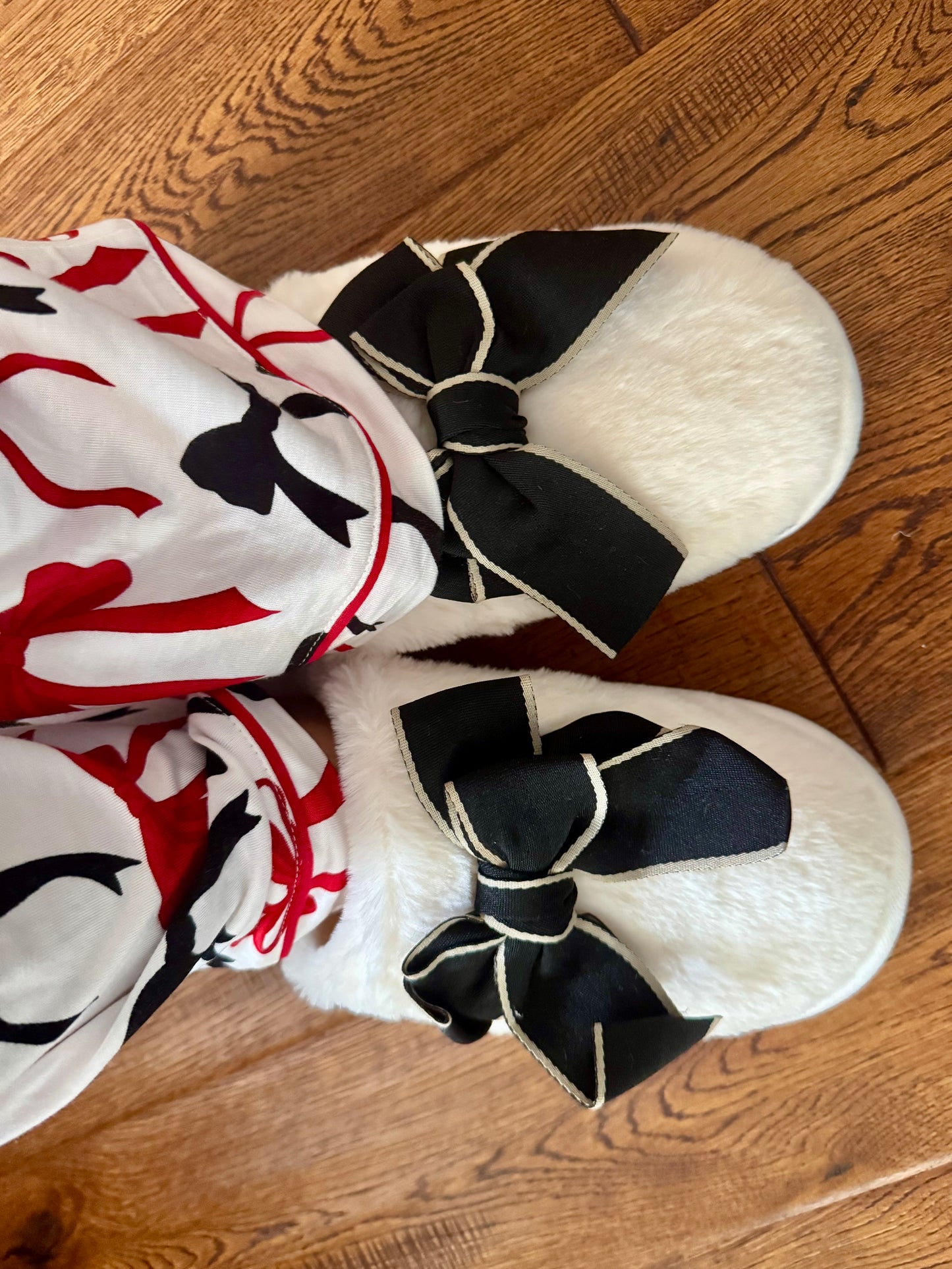Cozy cream slippers black bow goes great with pajamas!