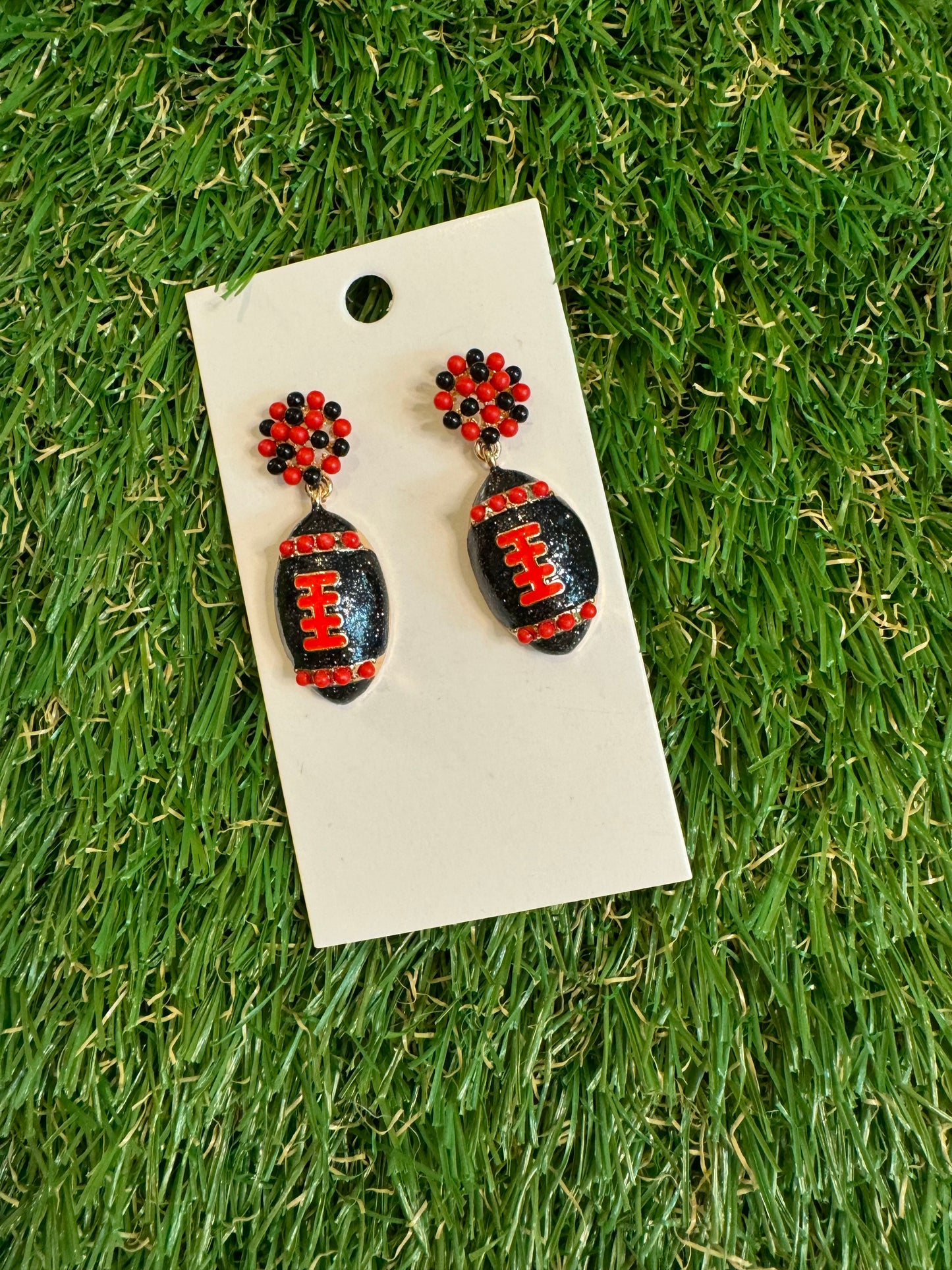 Red and black football drop earrings